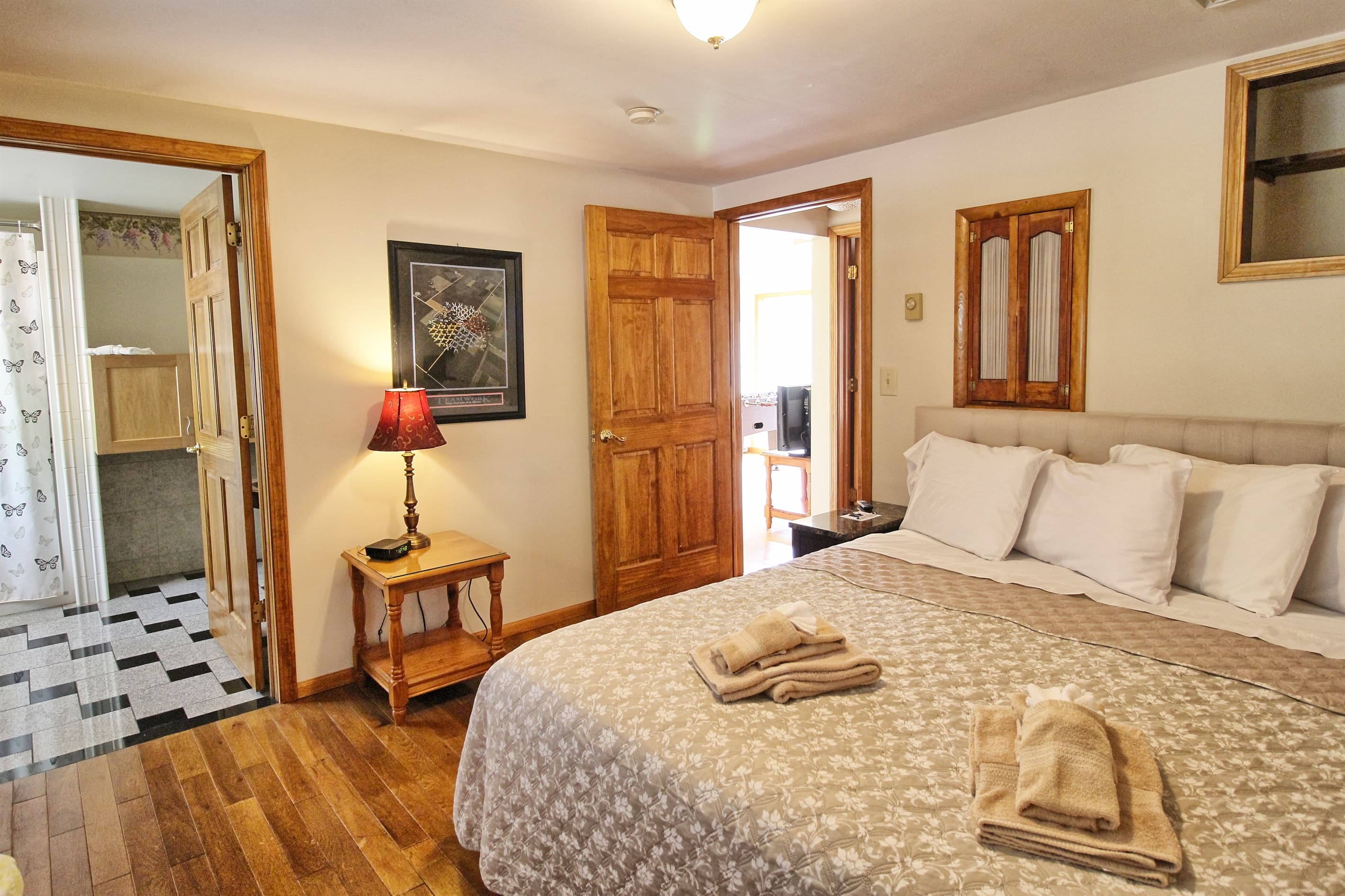 Bedroom #5 with King bed and en suite handicapped accessible bath