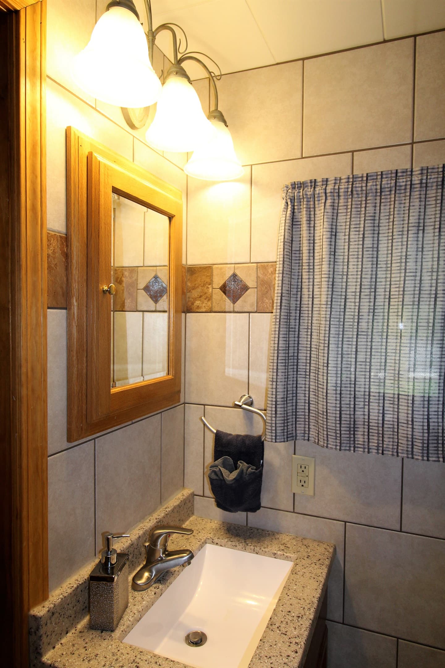En-suite full bathroom with stall shower for bedroom #3