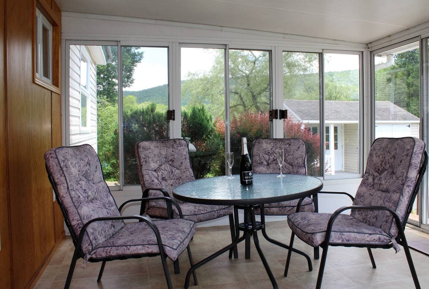 Relax with an evening cocktail on the 3-season sunporch