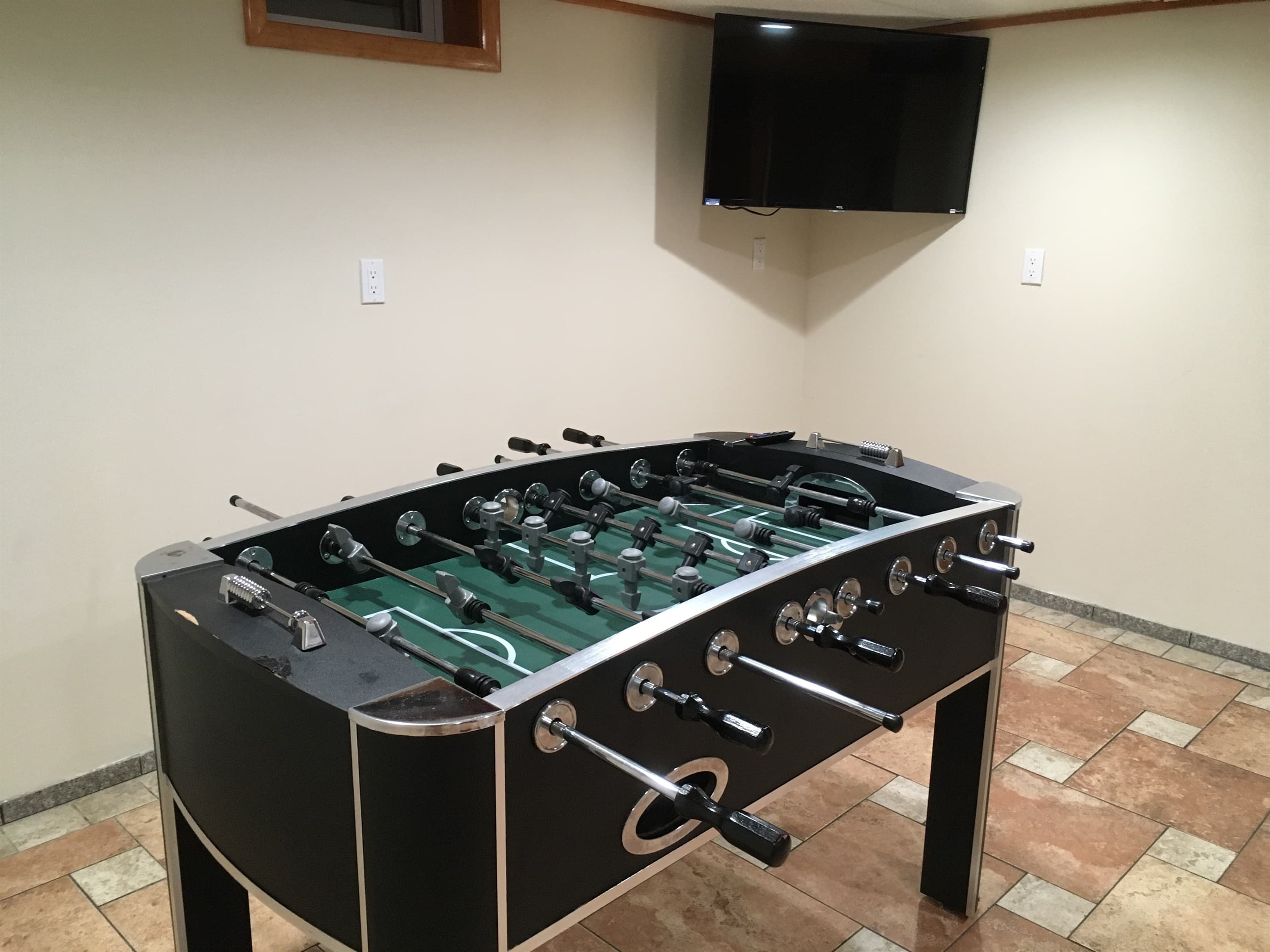 Foosball Table in basement for hours of enjoyment