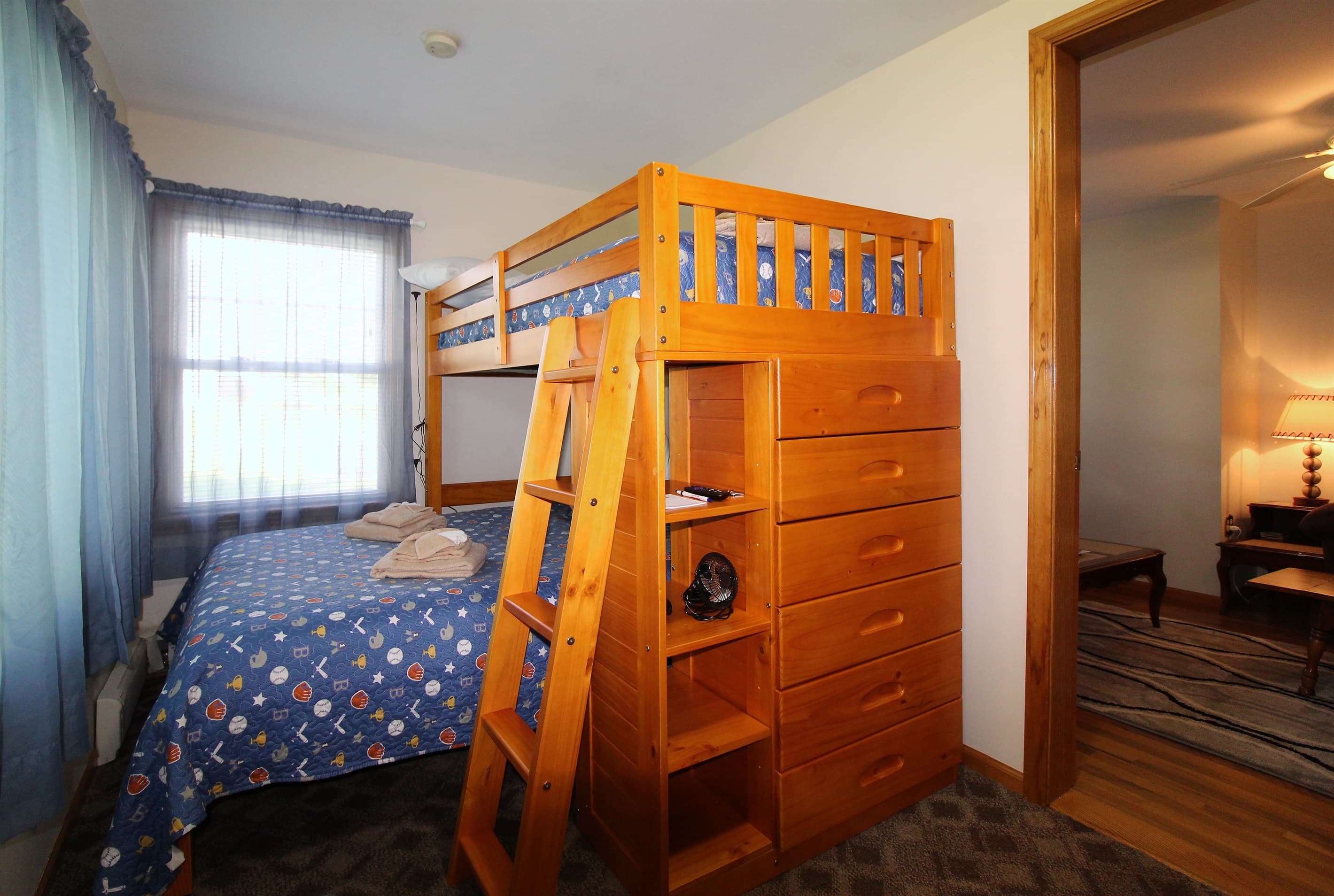 Bedroom #3 with twin over full bunk bed and foosball table