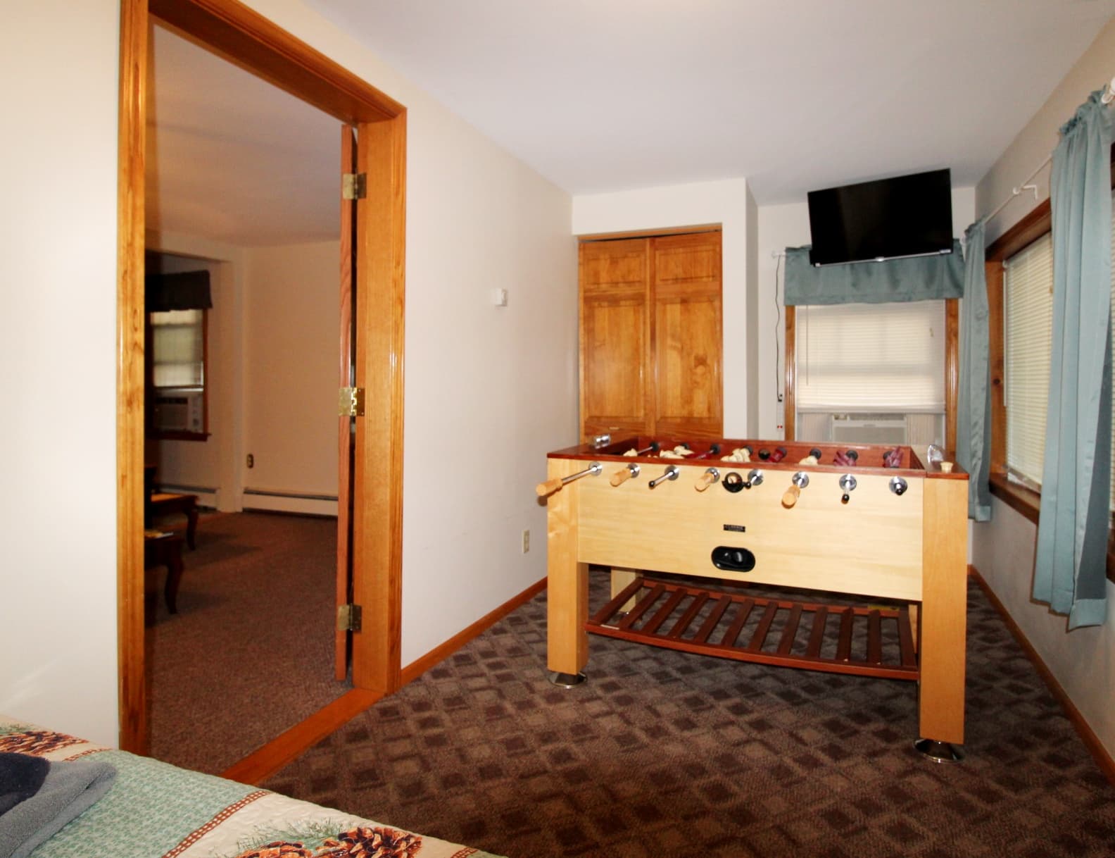 Foosball area in bedroom #3 with large flat screen smart Roku TV - perfect room for the kids!