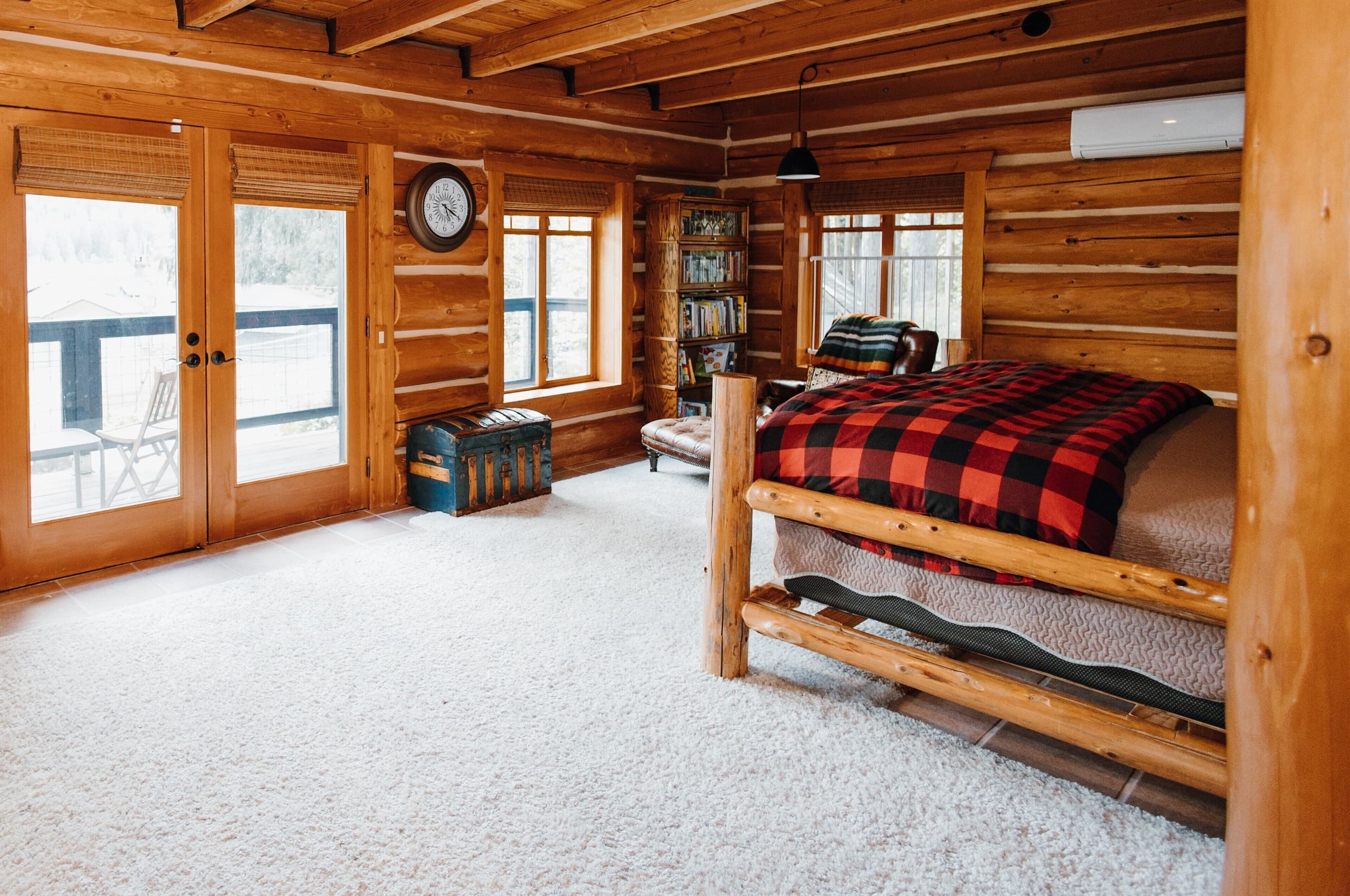 Master bedroom with king and twin bunk beds, second floor.