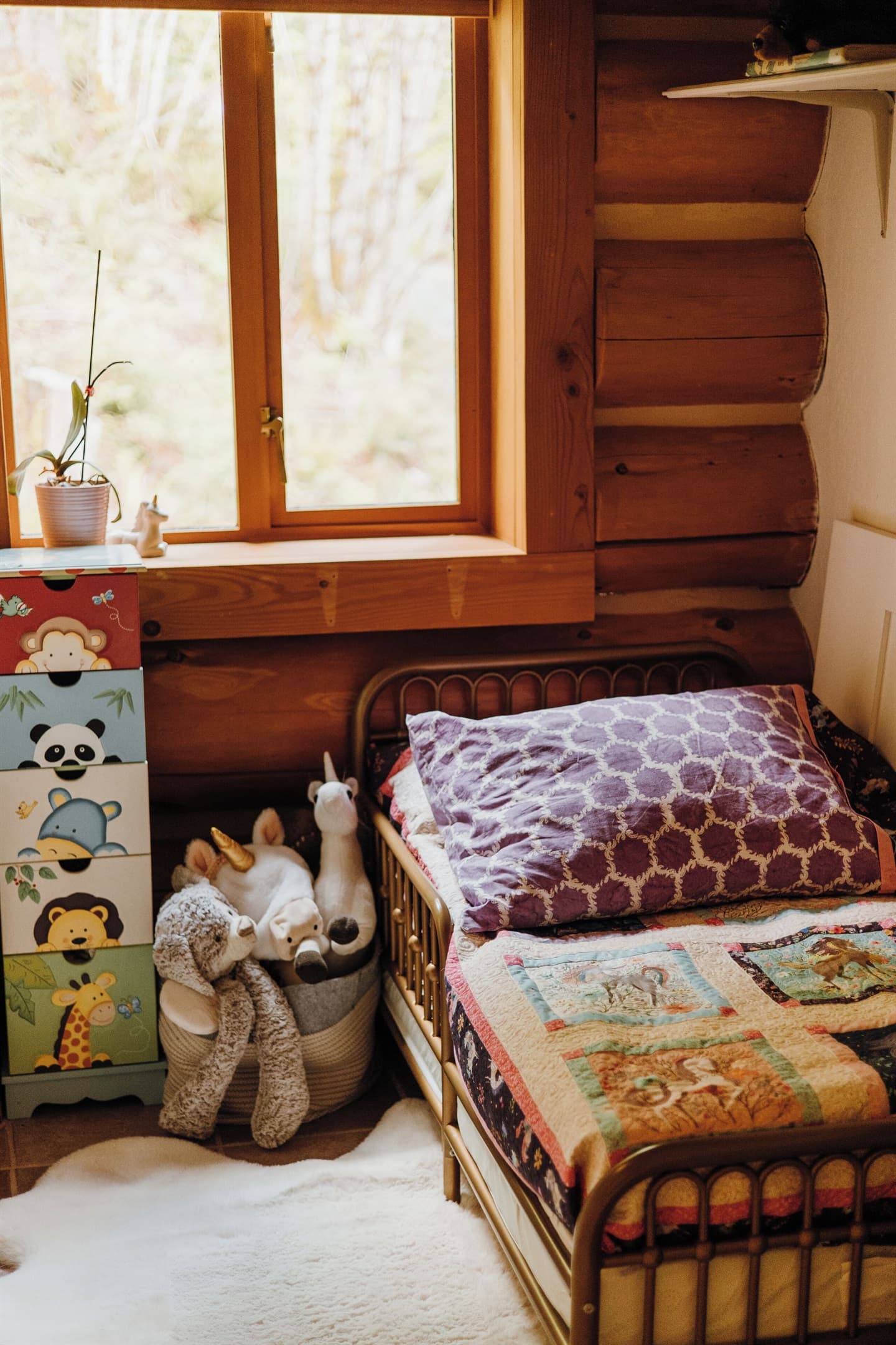 Toddler bedroom with a pocket door in the master bedroom, second floor.
