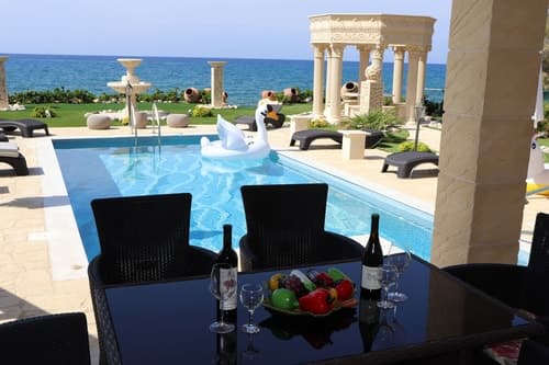 Luxury Beachfront Villa with a Pool