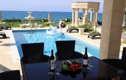 Luxury Beachfront Villa with a Pool