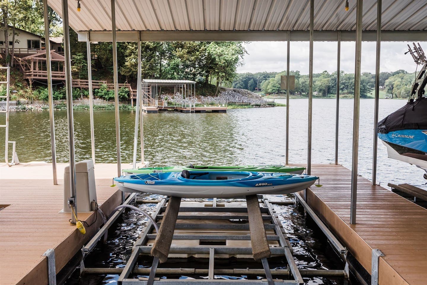 Beautiful Lake View with Blue and Green Kayak