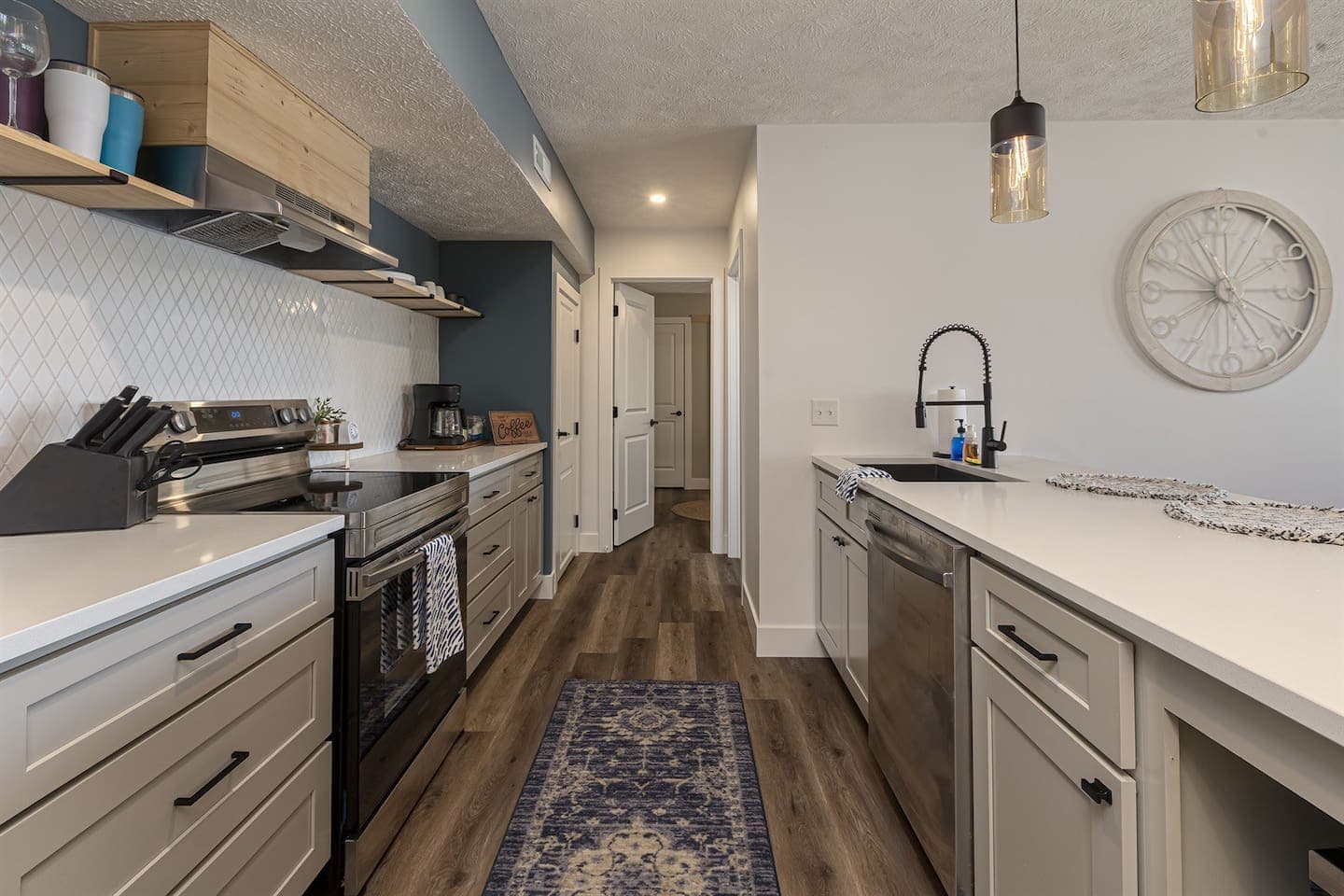 Kitchen leads to bathroom and bedroom