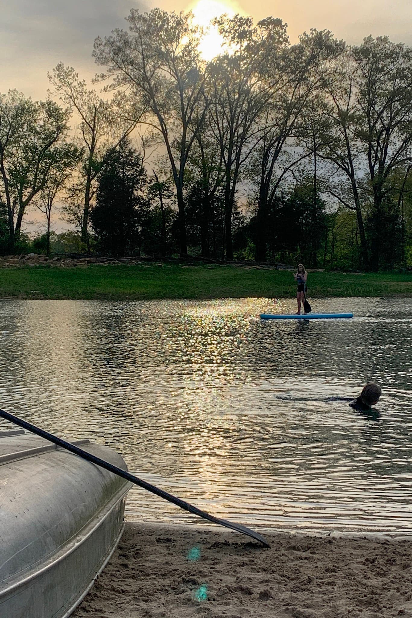 Pond view with paddle boards