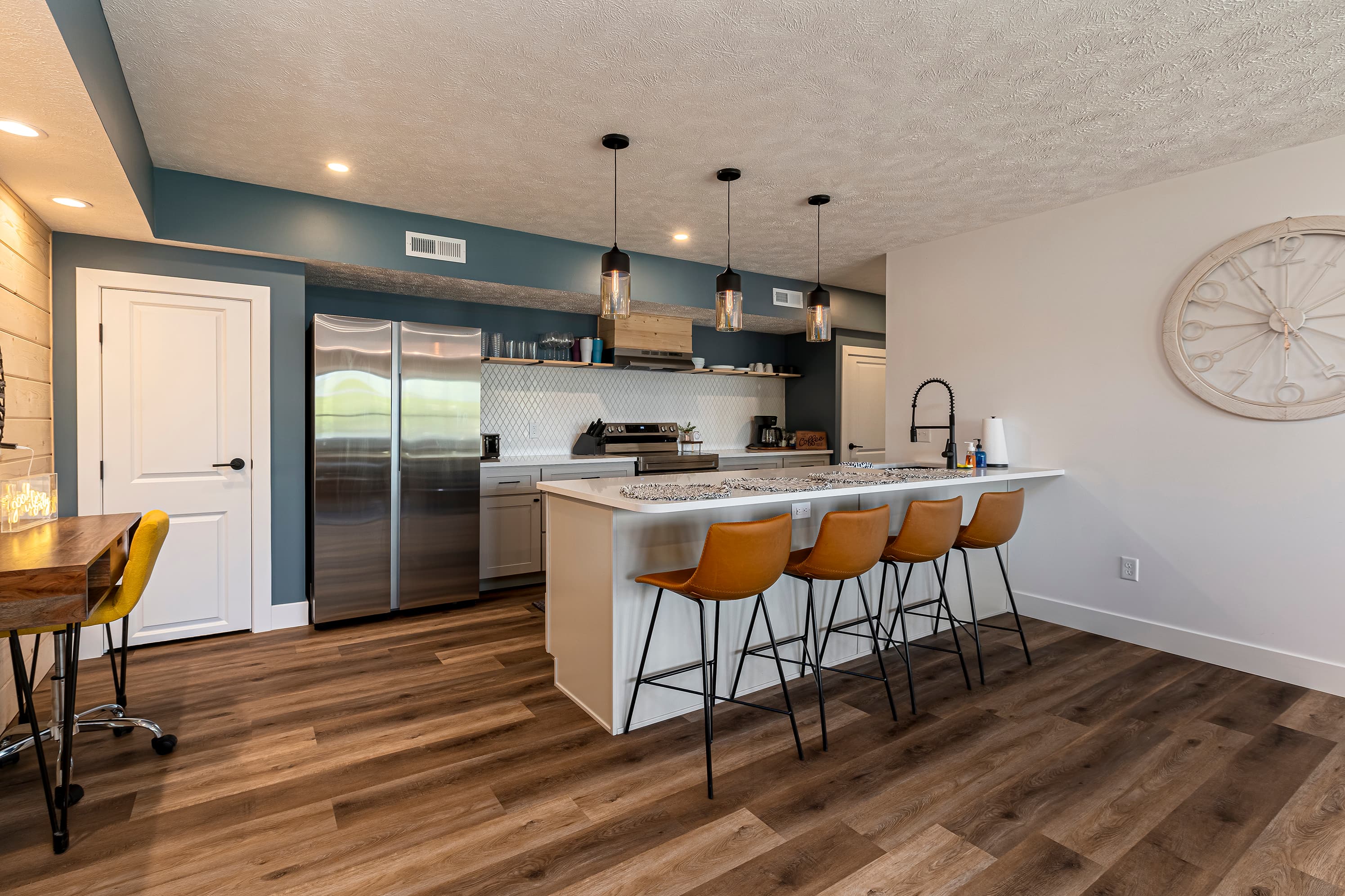 Fully stocked kitchen with seating