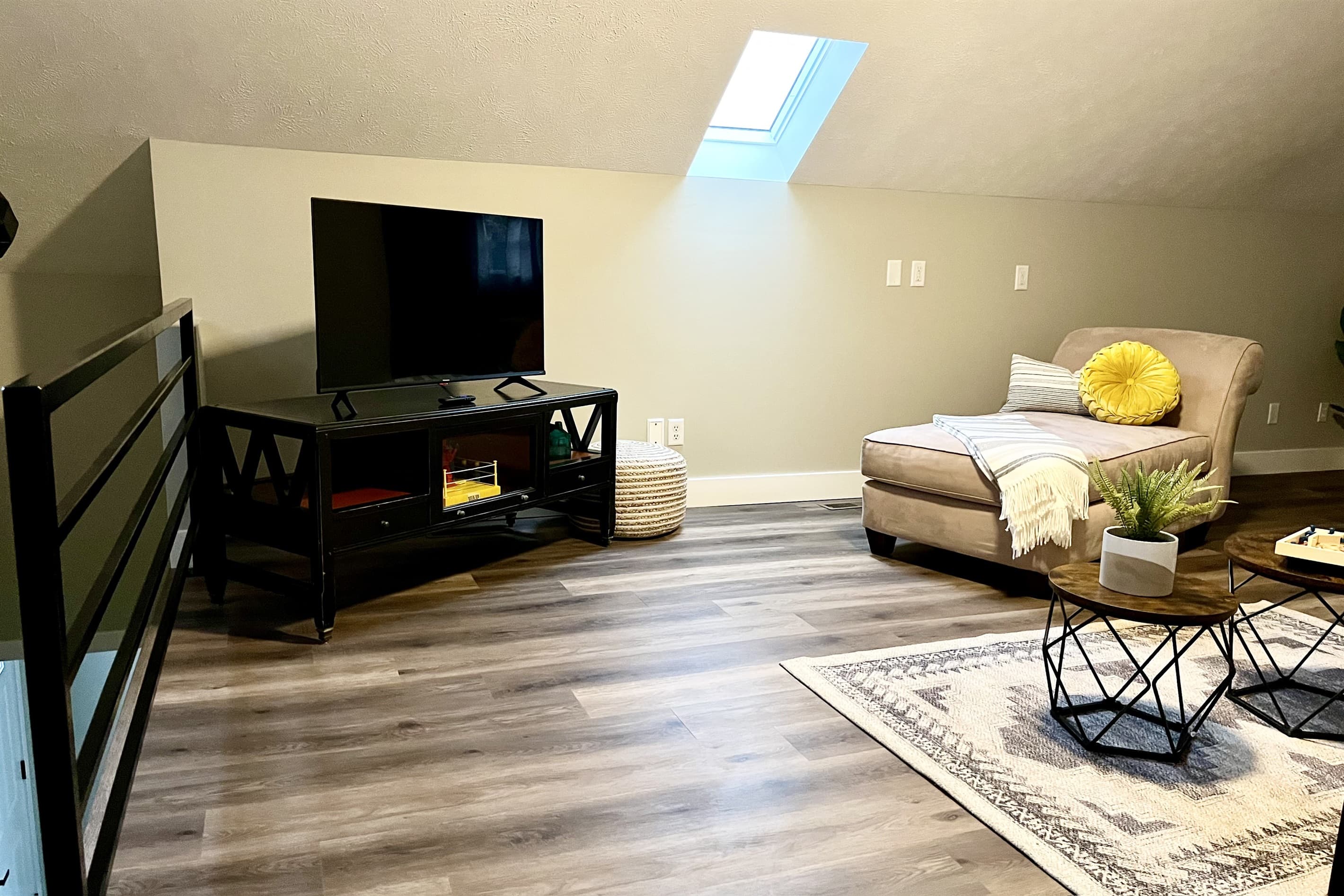 Upstairs living area with TV