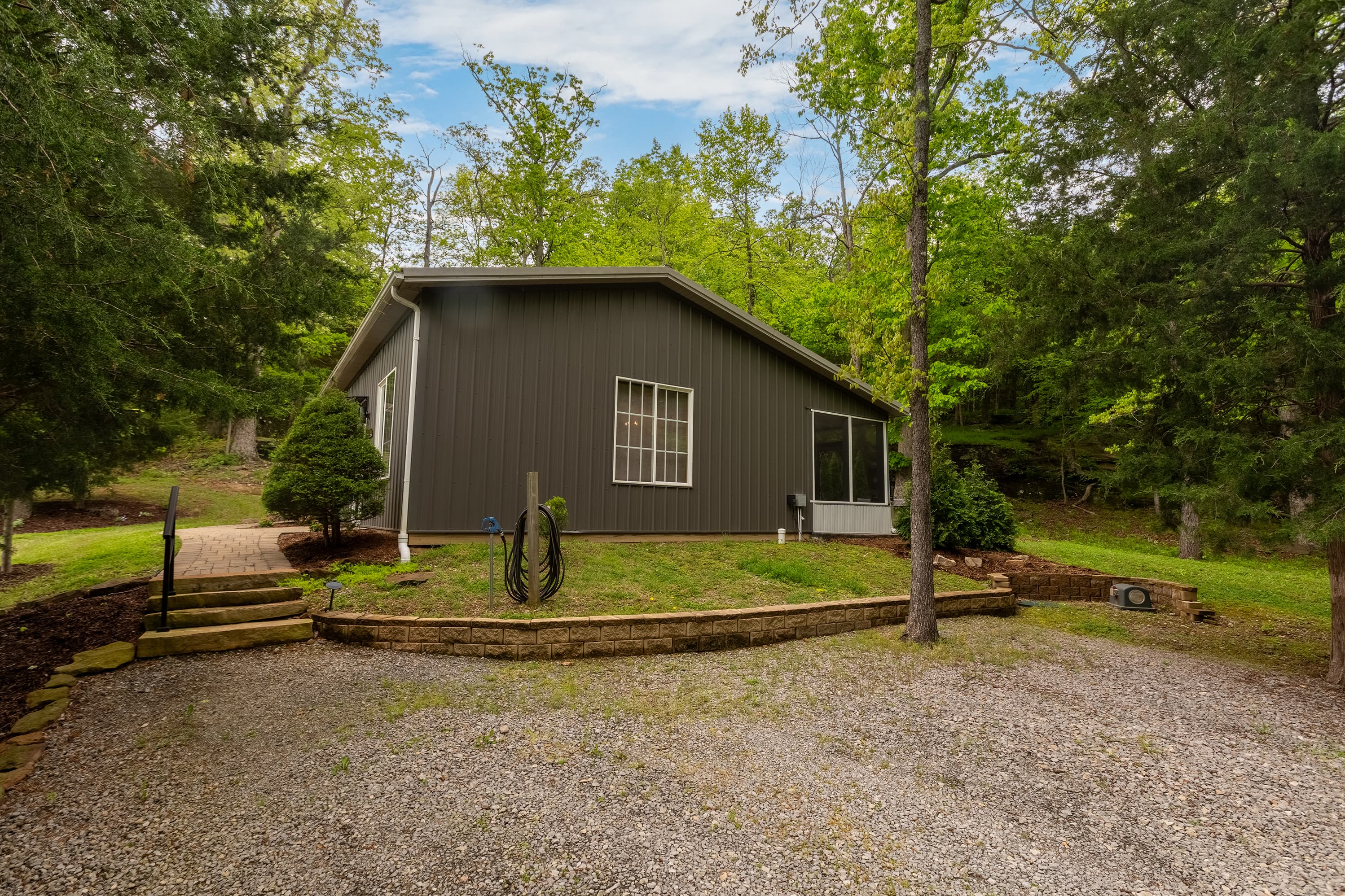 Ample driveway for up to 2 vehicles and/or boat trailer