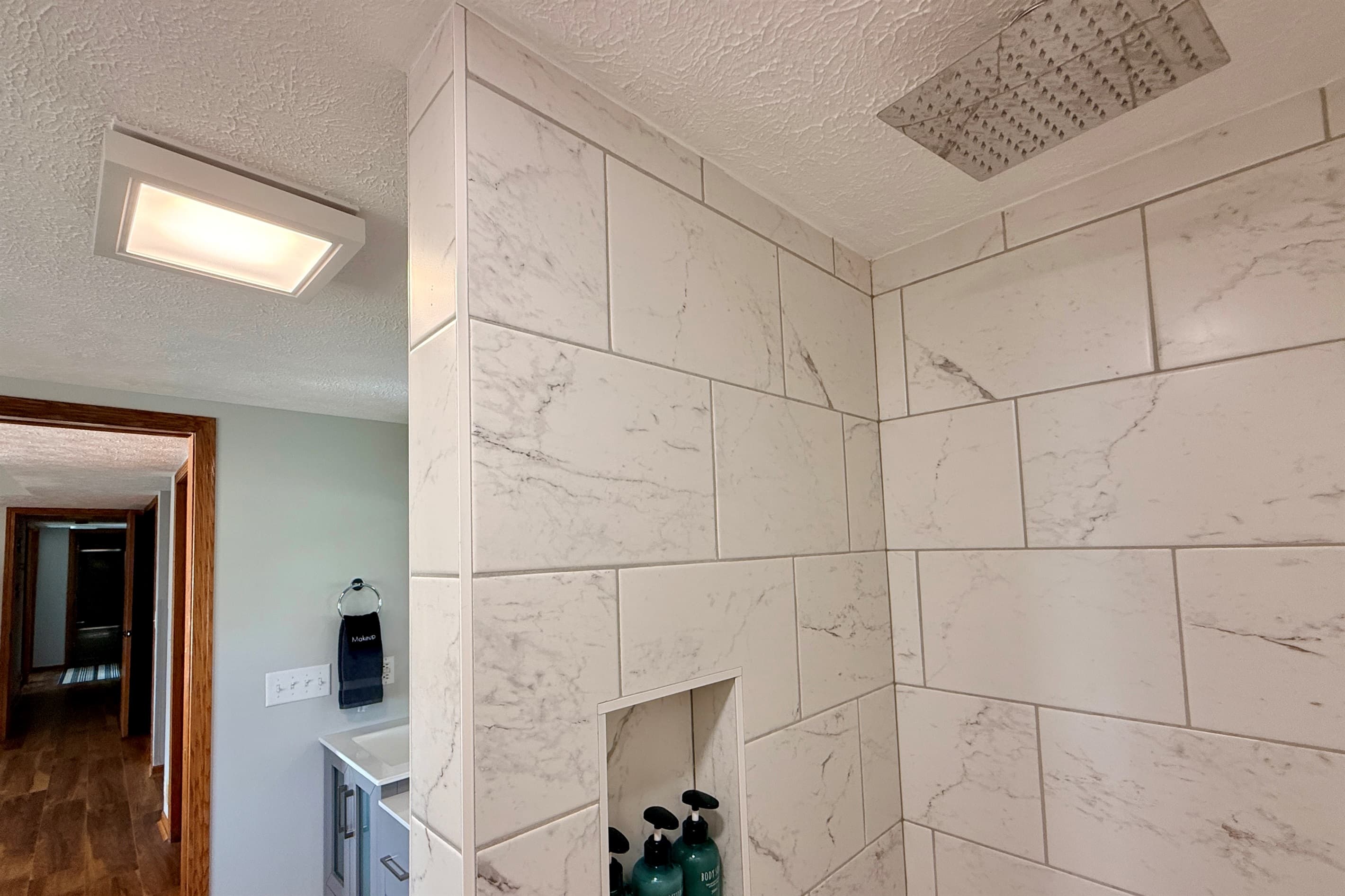 Rainfall shower head in master bathroom