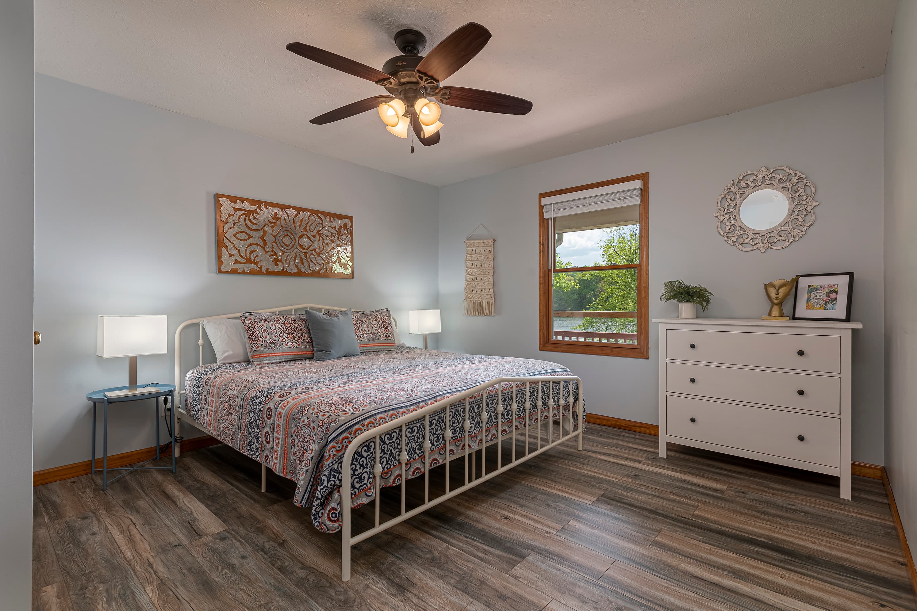 Main level bedroom with king bed
