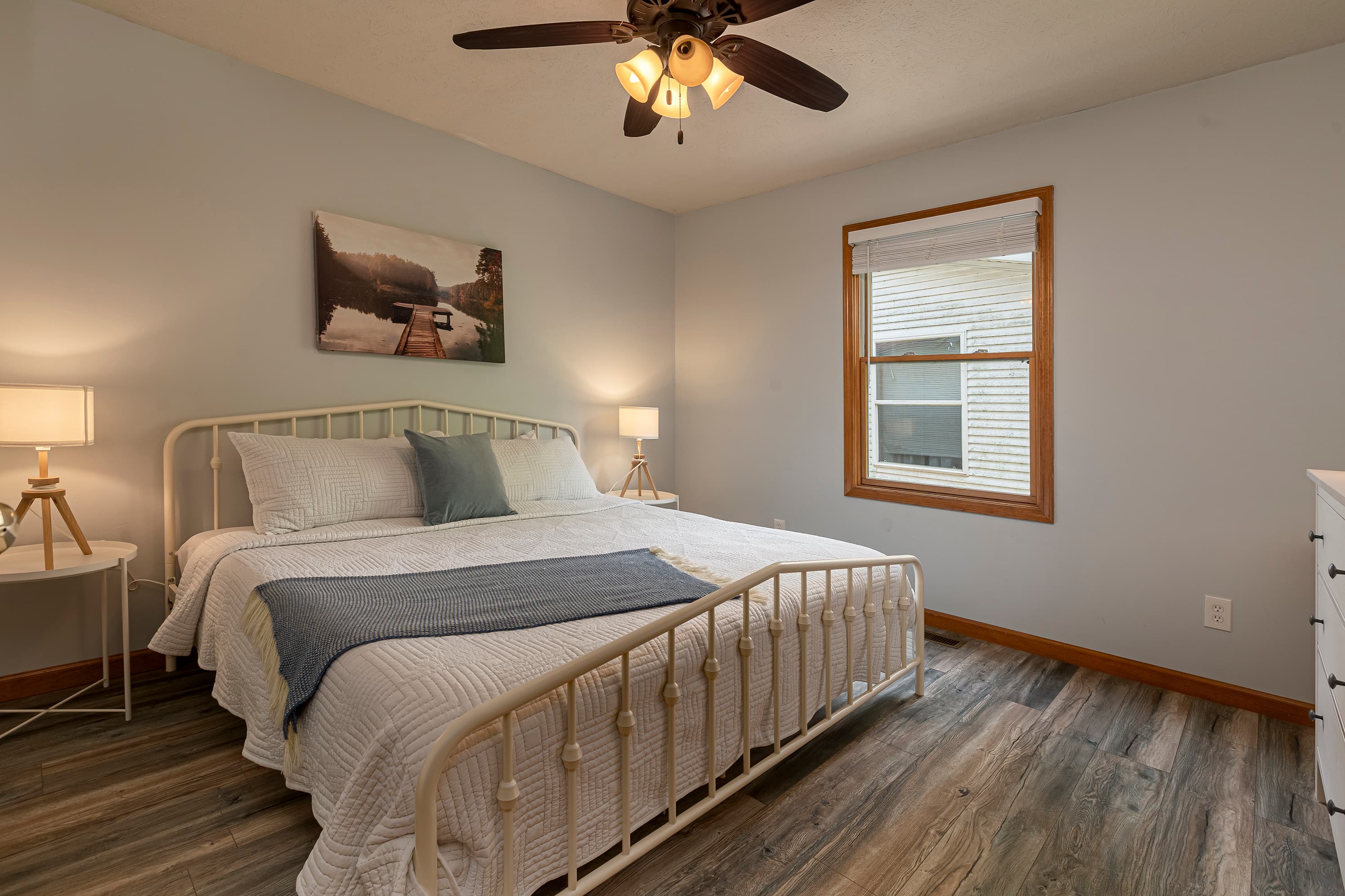 Main level bedroom with king bed