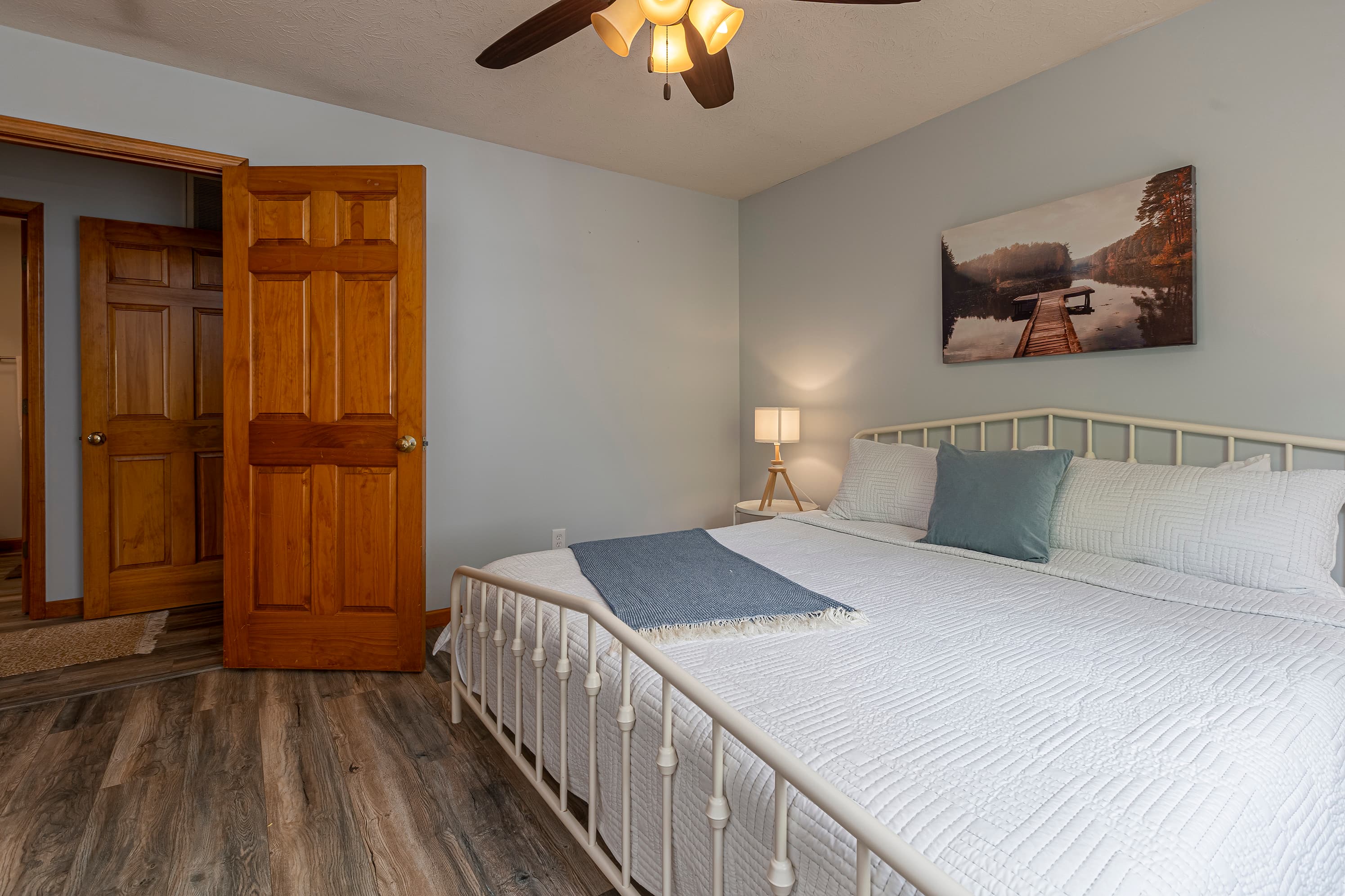 Main level bedroom with king bed