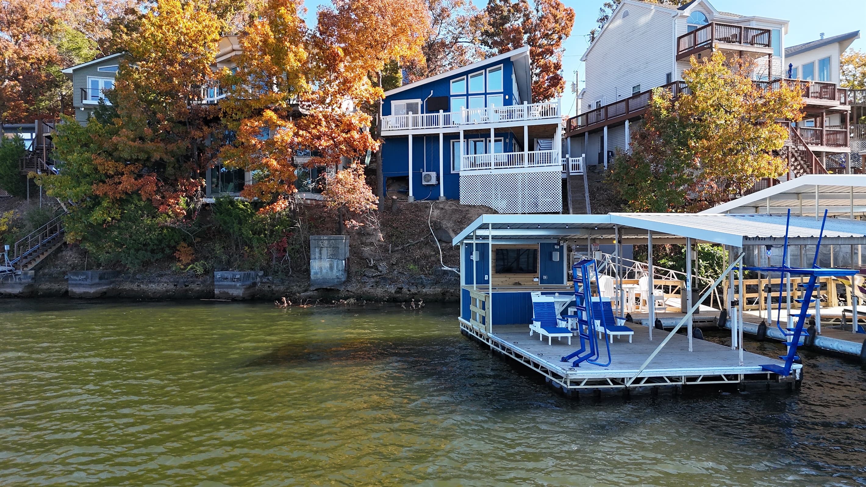 DOCK WITH 12X26 SLIP HIGH DIVE LADDER AND HUGE PARTY BAR WITH TV