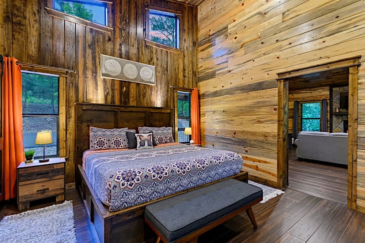 Custom king bed with mood lighting in headboard
