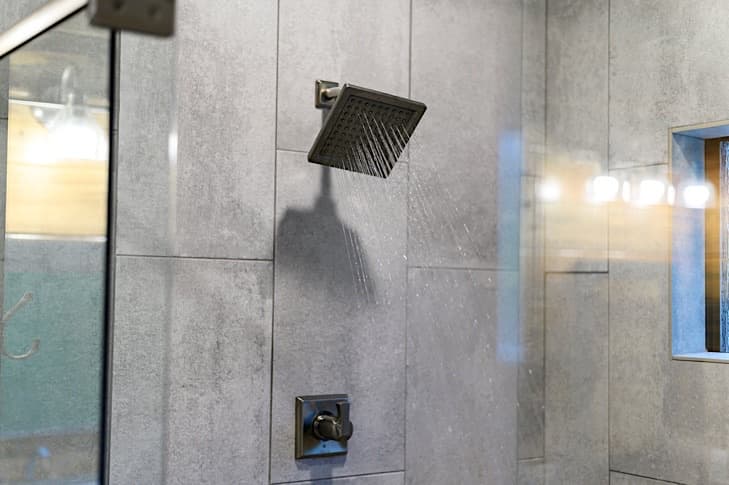 Large walk-in shower with dual heads, body jets and rain head