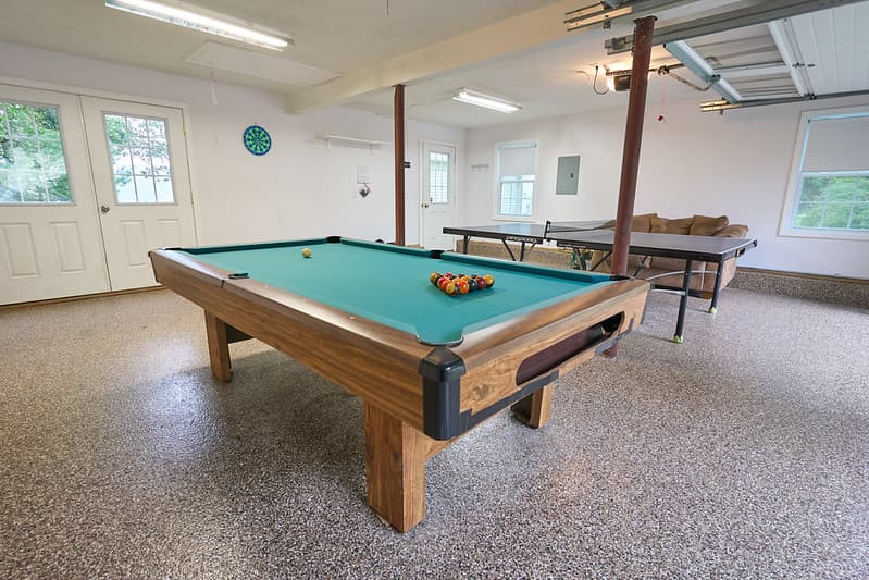 Ping png table and slate full size pool table in game room/garage