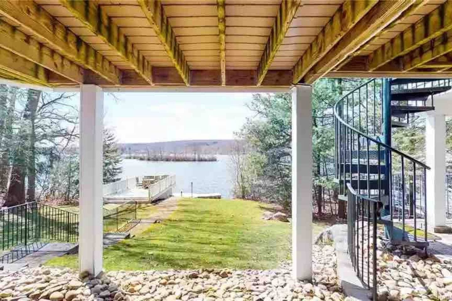 View of lake from lower patio, accessed from lower level living room