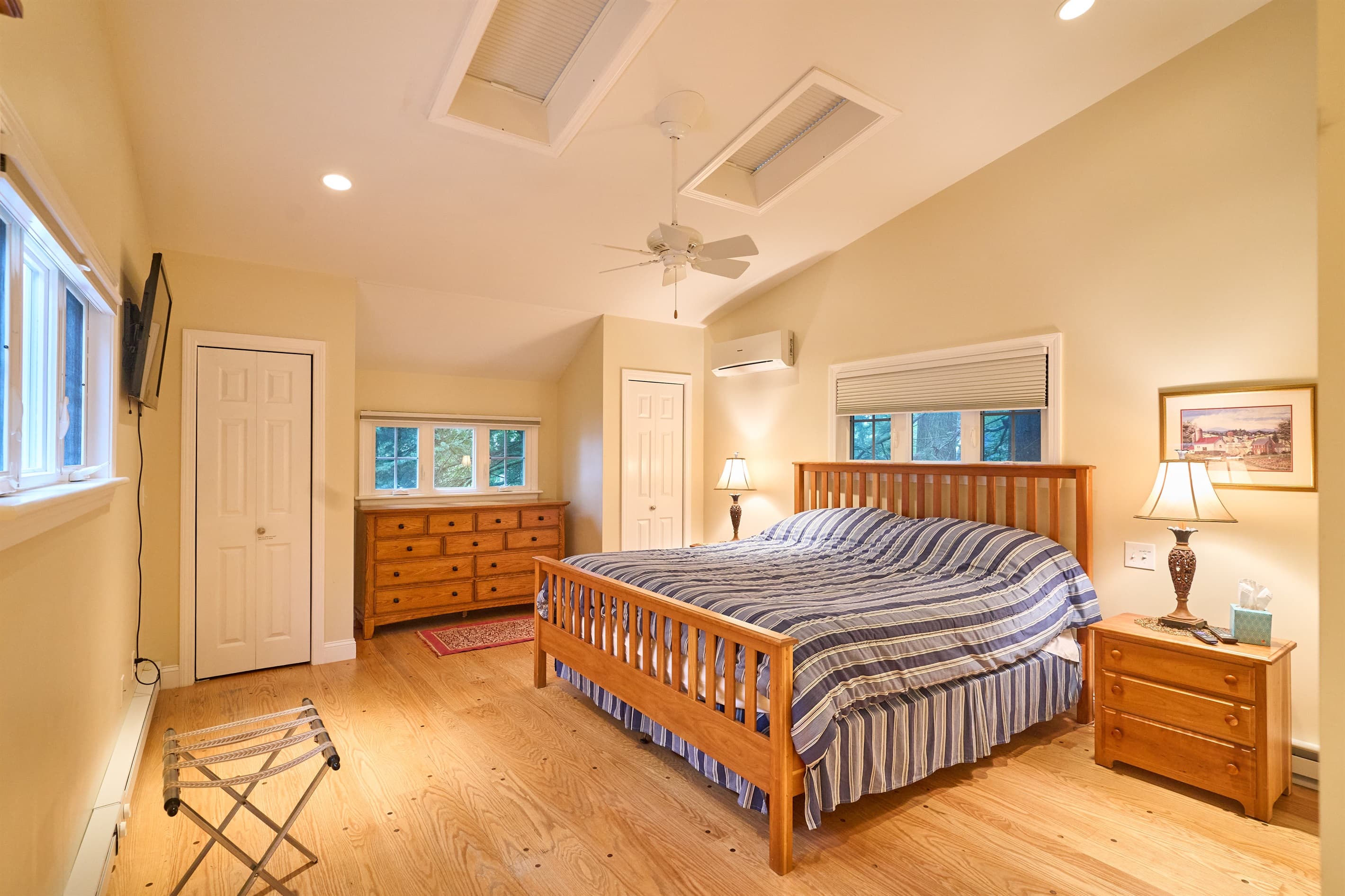 master bedroom with king bed, on the upper level.
