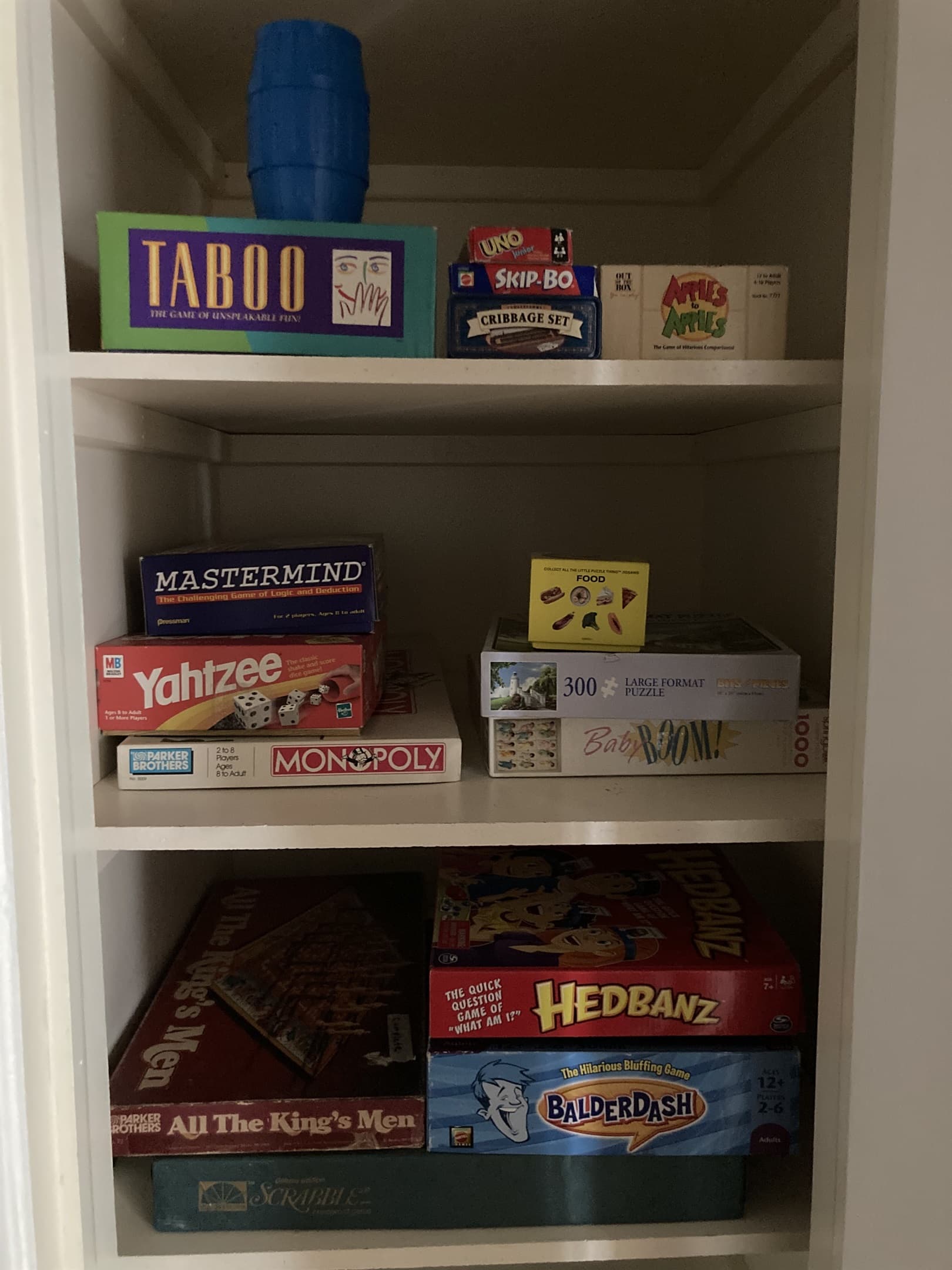 Games in upper level hall closet. Actual games may vary, as I am frequently replacing games that have missing pieces and adding new games and puzzles. 