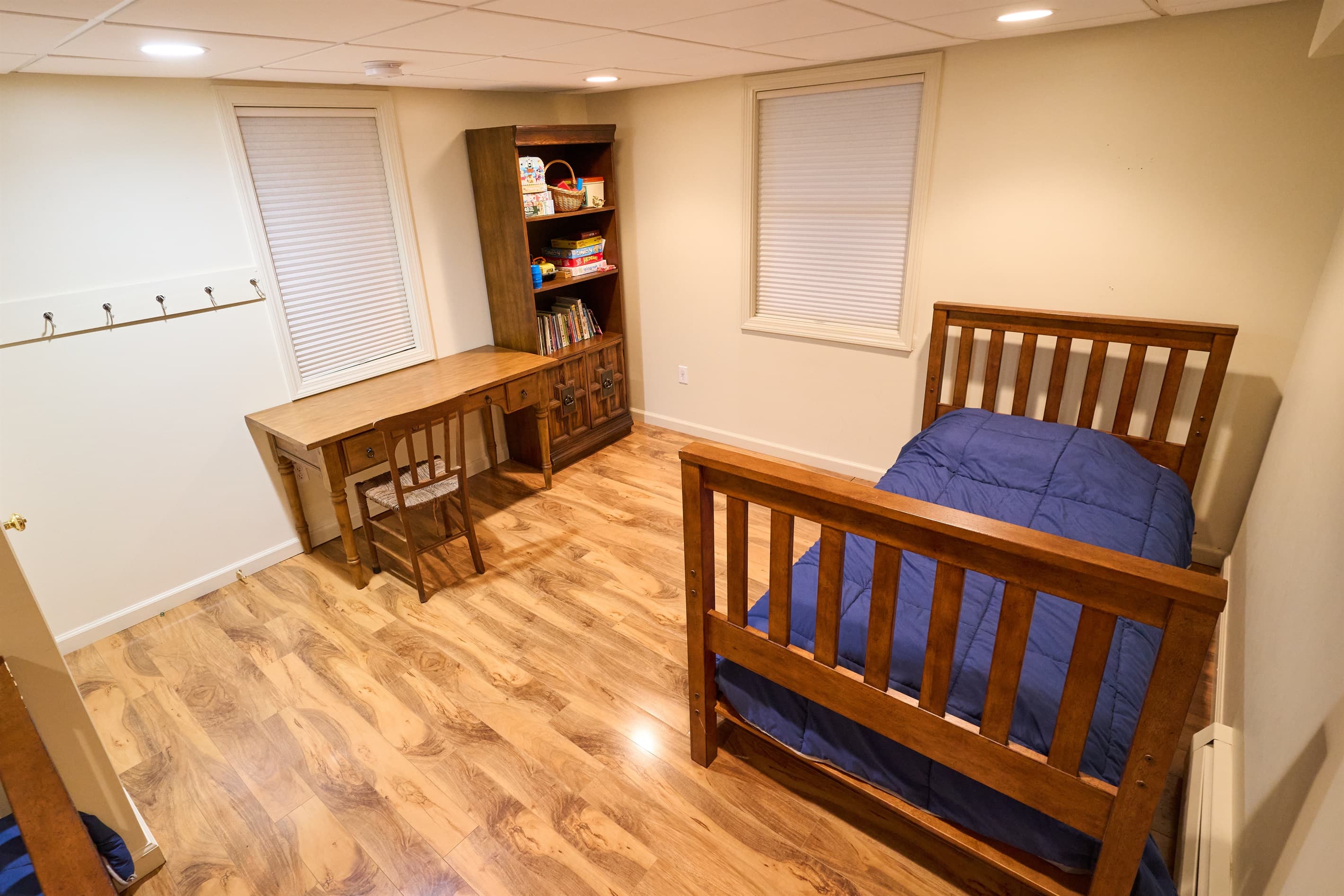 Bedroom on the lower level has a twin bed and a full bed.