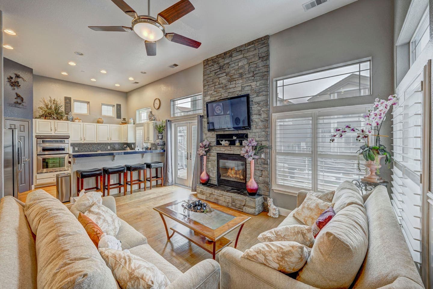 This gorgeous home is inviting and relaxing with comfy seating, gas fireplace and large TV.