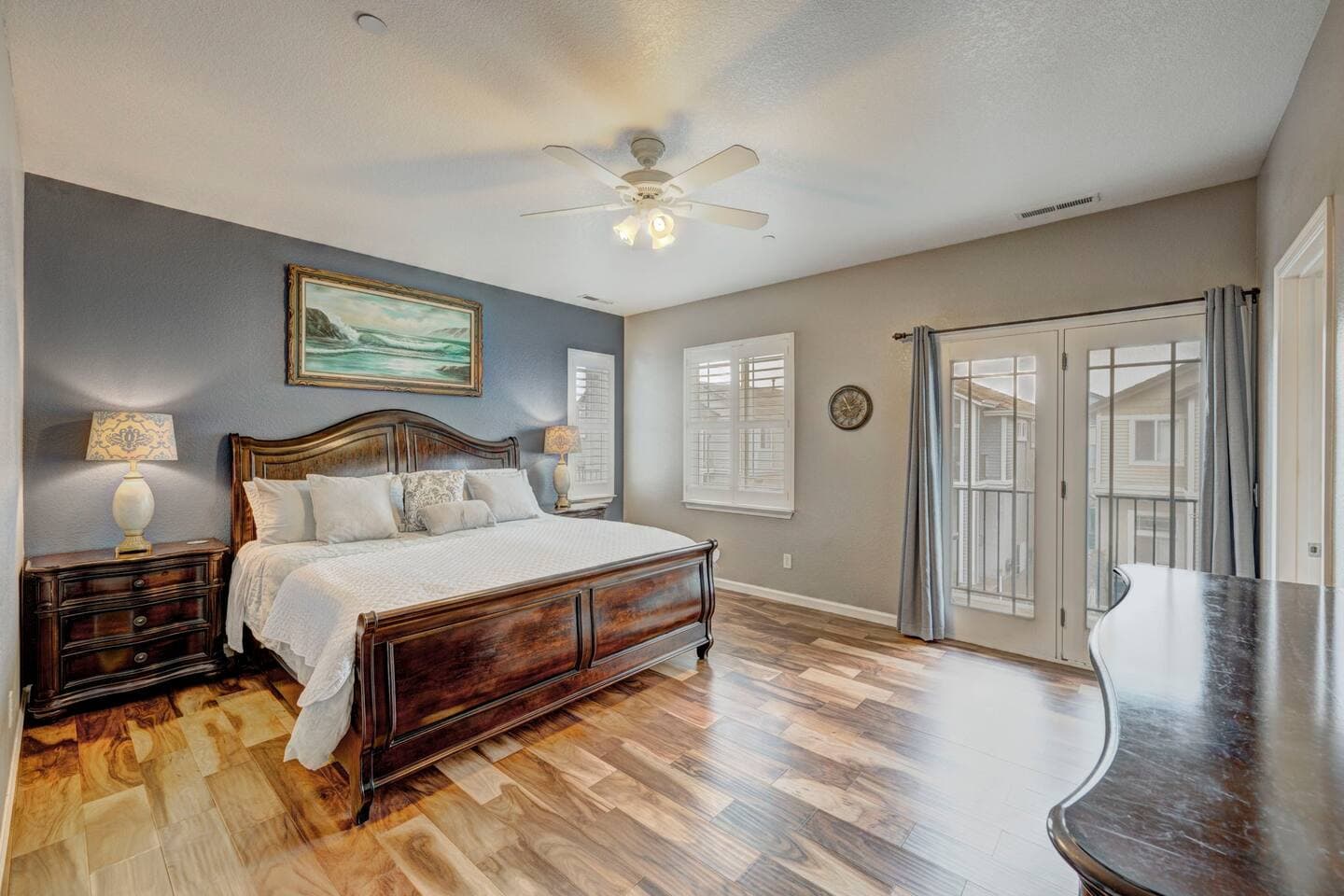 Gorgeous primary suite with a comfy king-size bed.