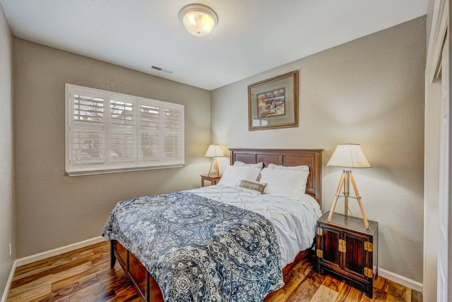 Comfy bedroom three features a full-size bed
