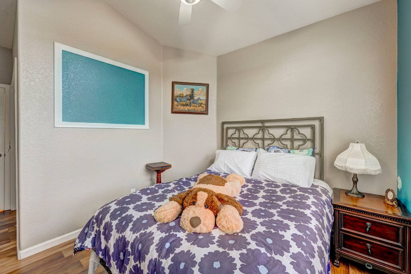 The cozy fourth bedroom also with a queen bed.