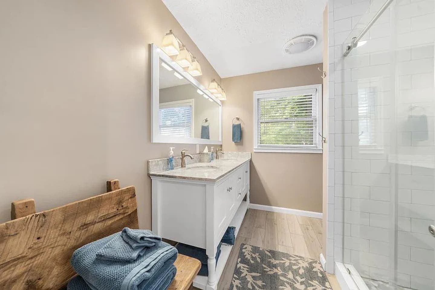 3rd Full Bathroom located in common areas of the house for easy access from family room/kitchen where the murphy bed is located.