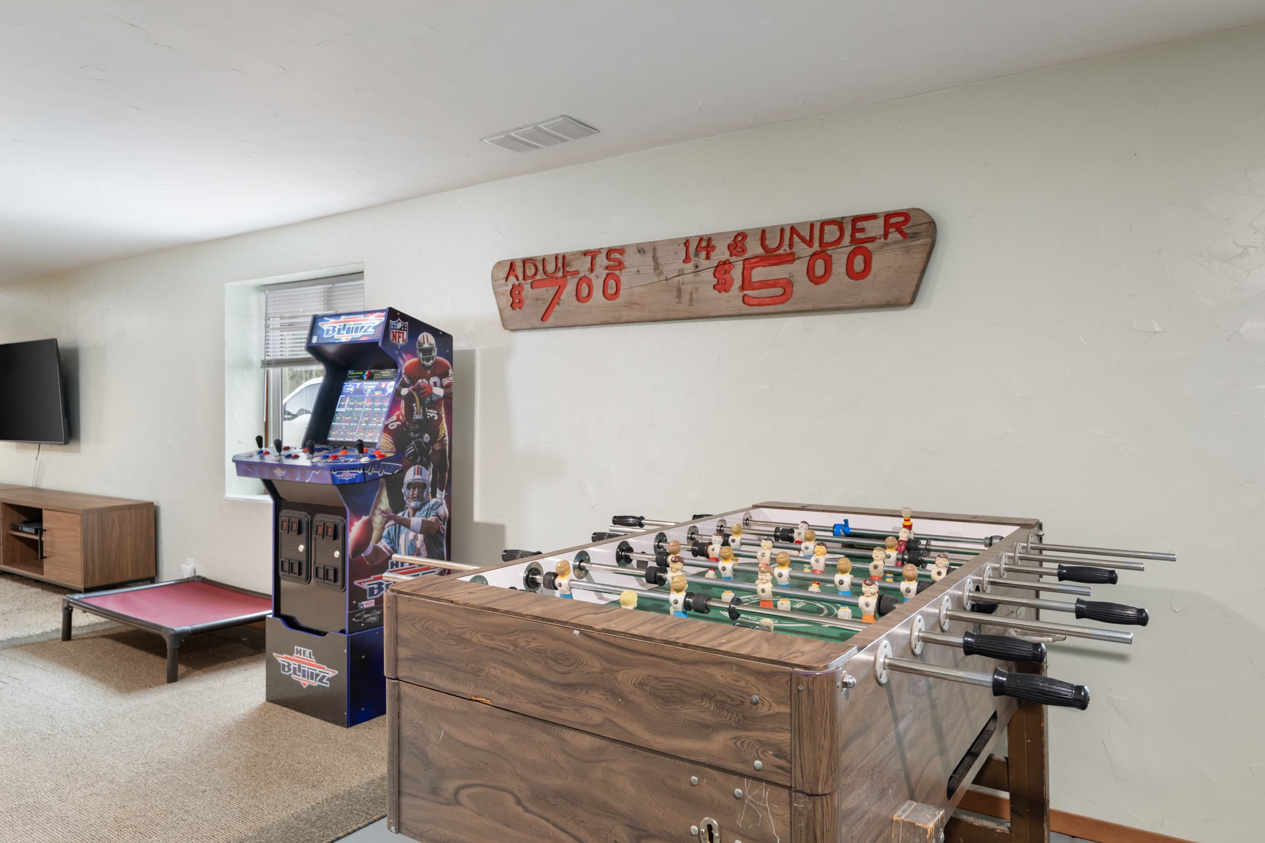 Game time! Try your hand at foosball or NFL Blitz