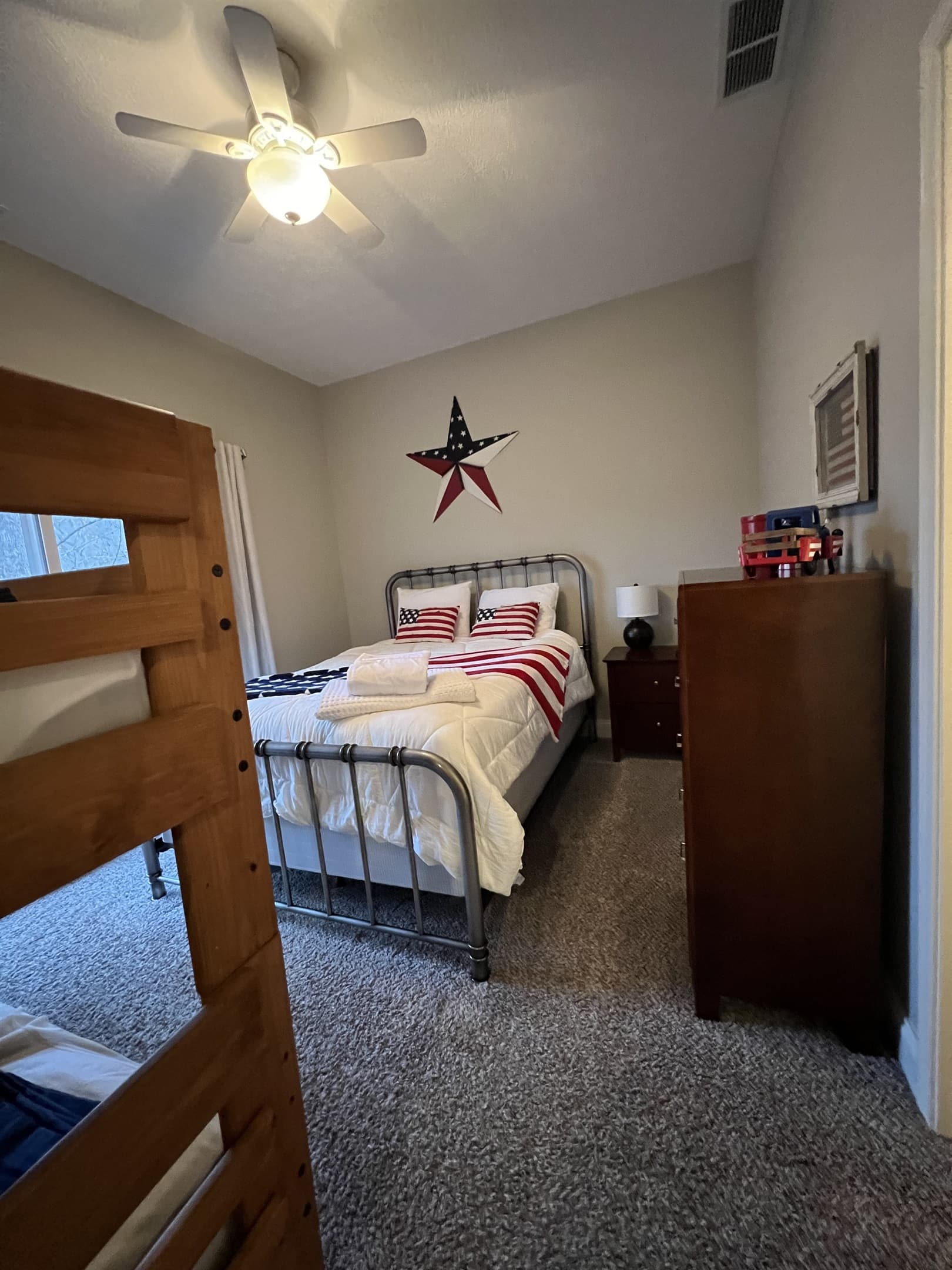 lower level queen plus twin bunks. lakefront