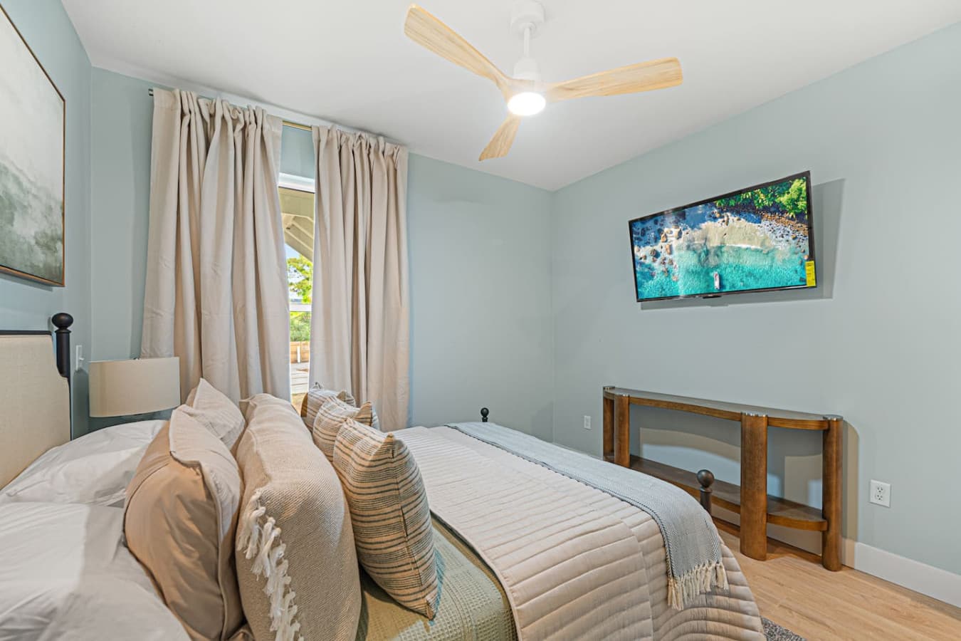 Primary suite complete with a large smart TV