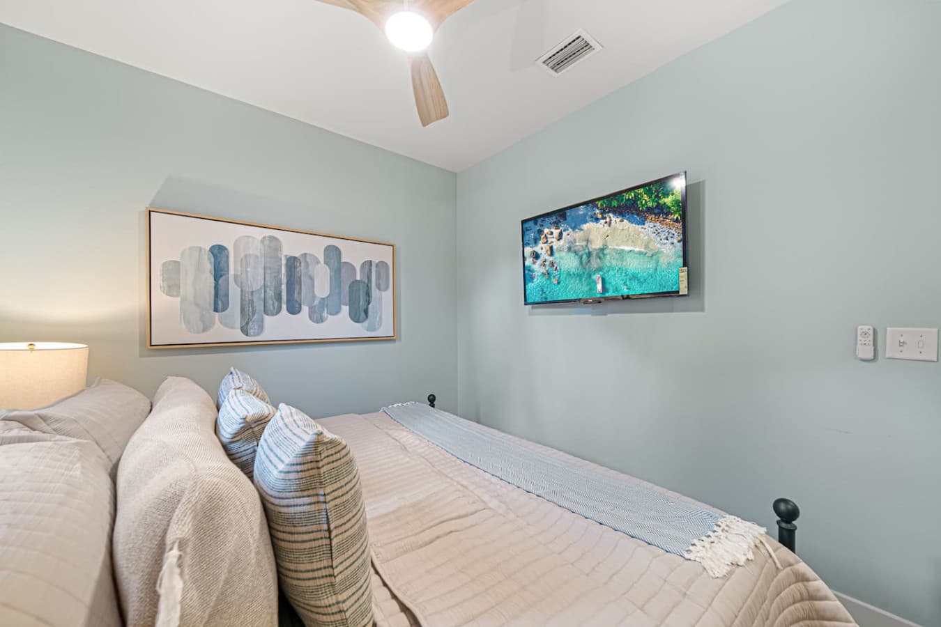 A large smart TV located in the bedroom for convenience