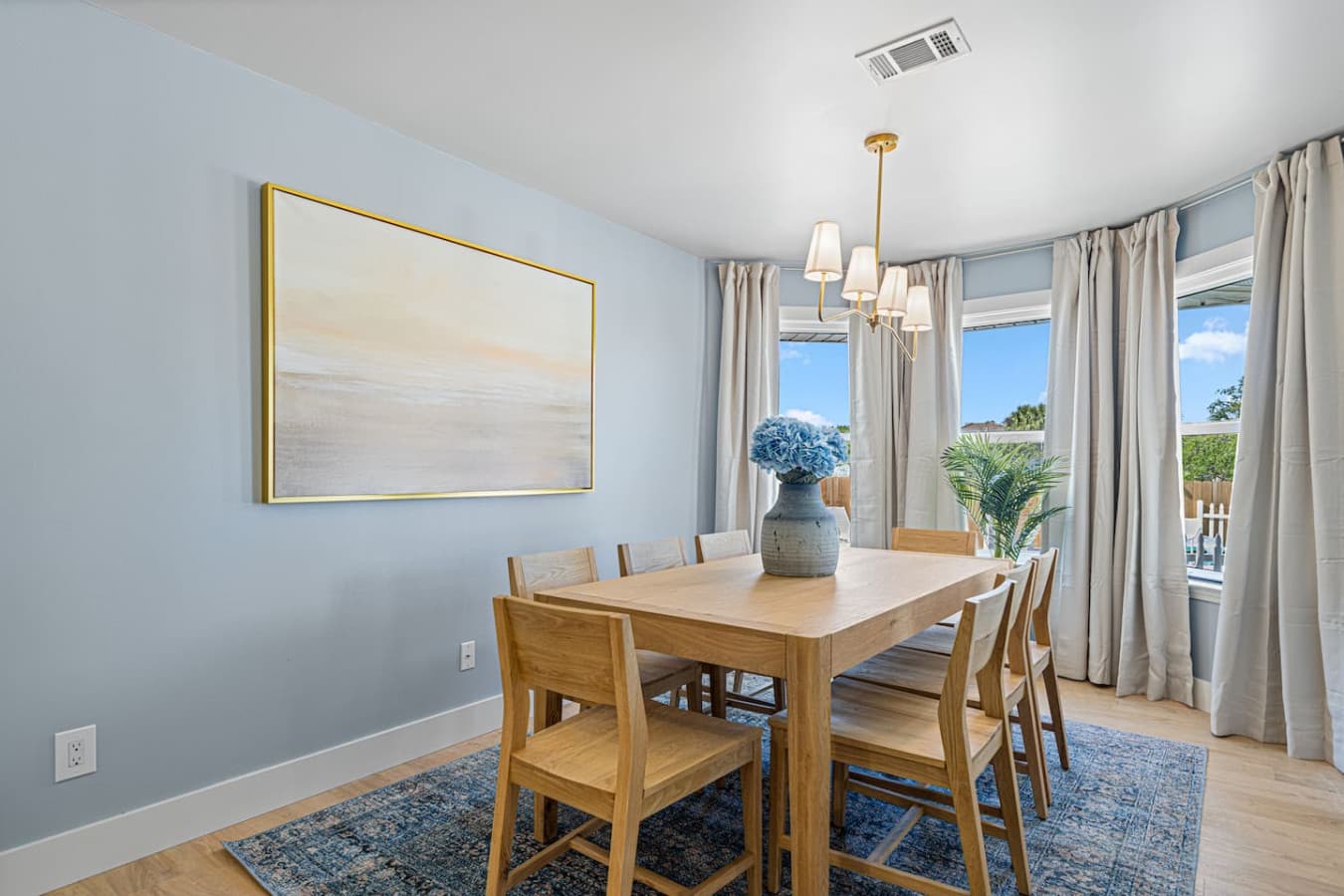 Elegant dining area with plenty of seating downstairs.