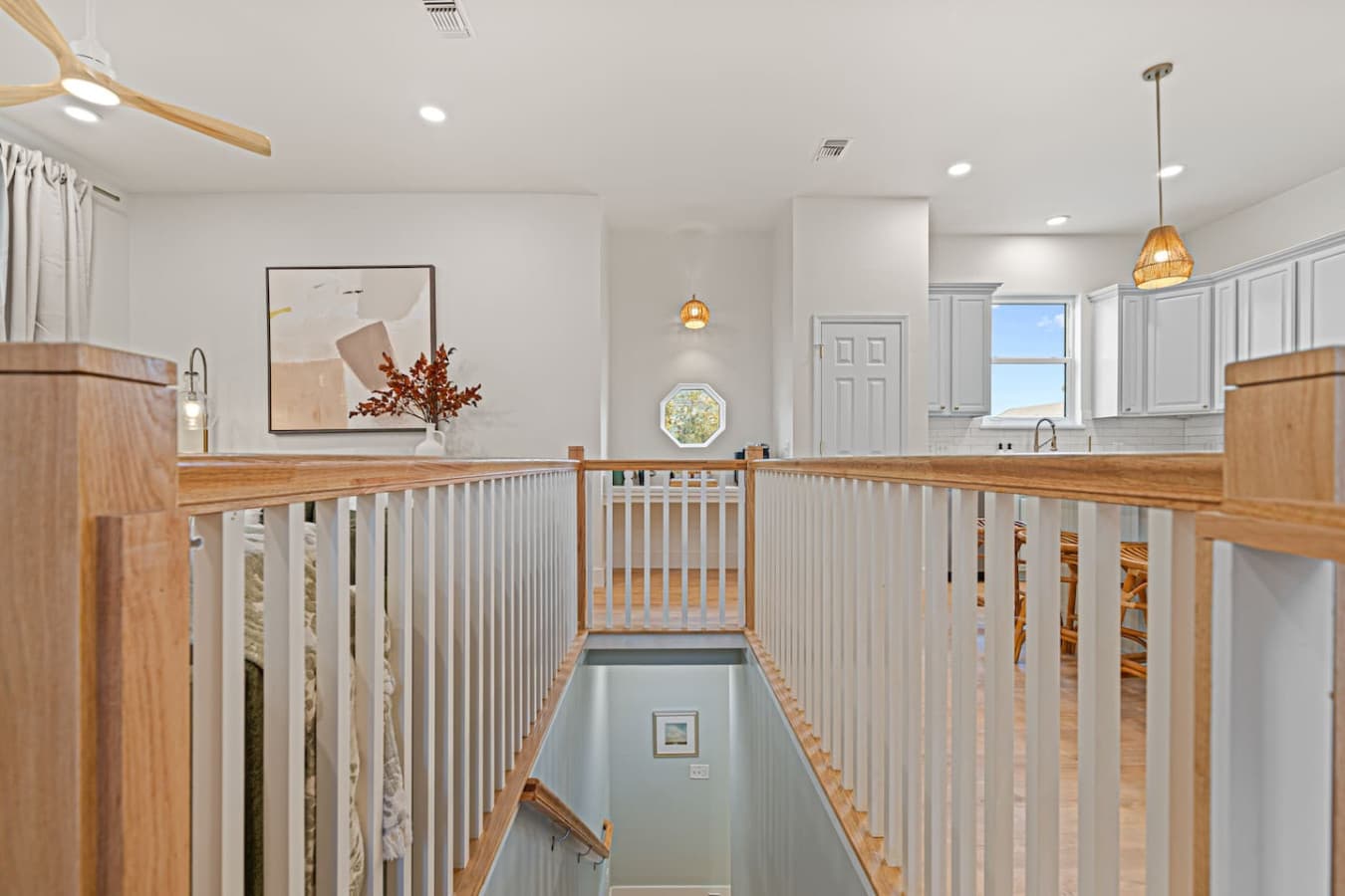 Kitchen and living is upstairs while bedrooms and bathrooms are downstairs