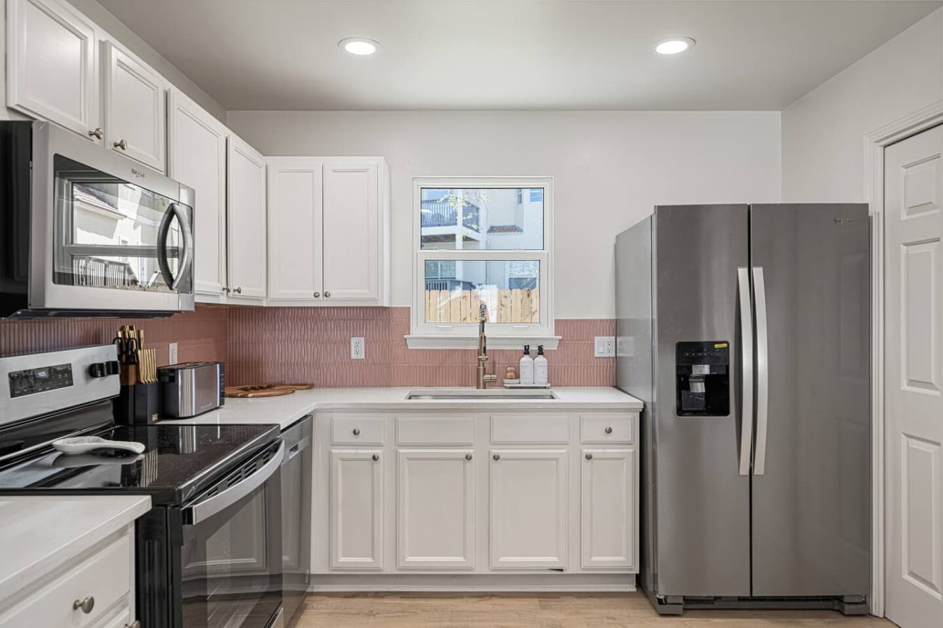 Pink House: Compact but mighty—another full suite of appliances.