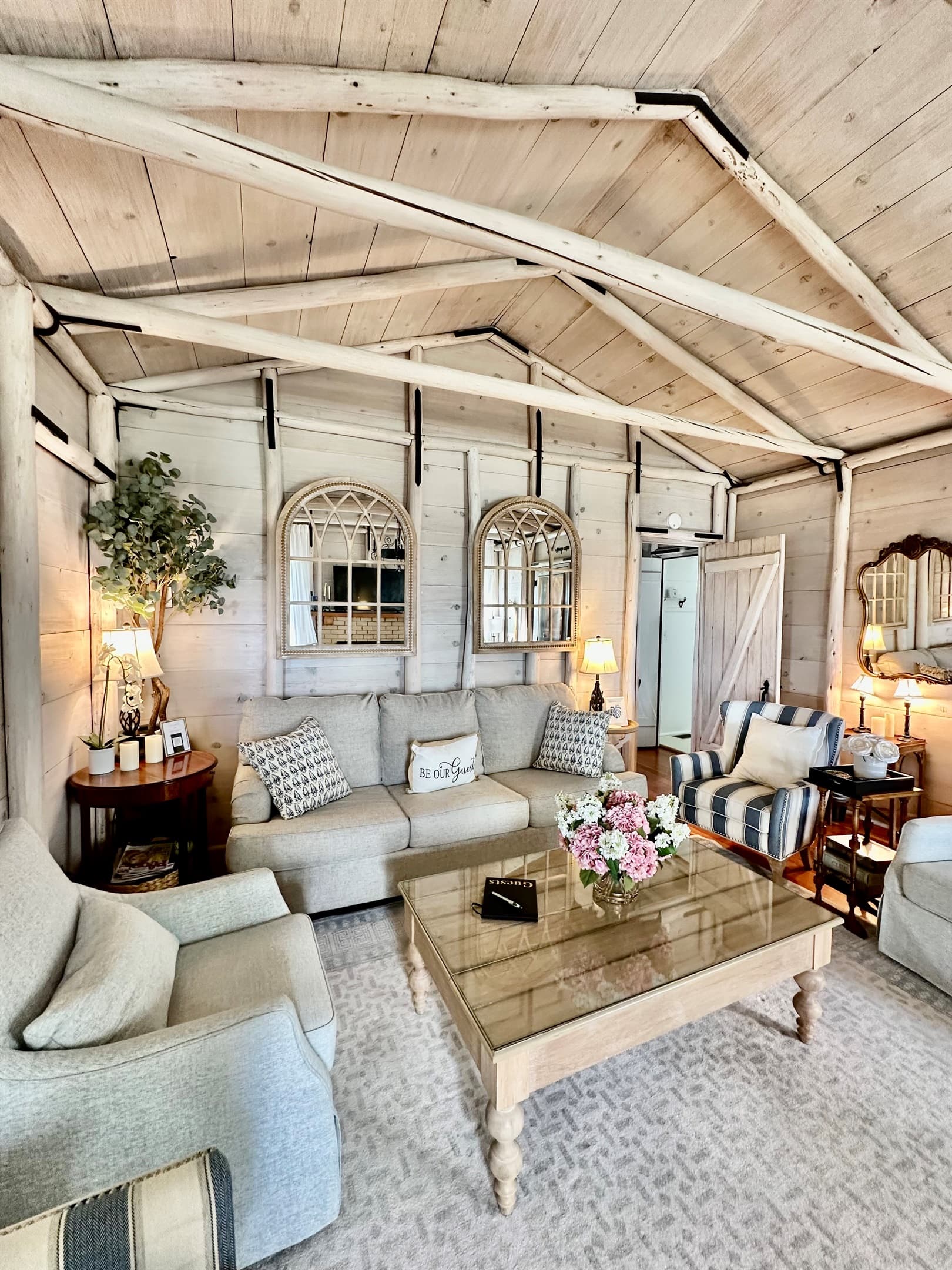 Get cozy in the living room of this turn of the century cottage built in the early 1900s.  The beams are from our own eucalyptus grove on the property and all original planks and iron strapping and hardware.  
