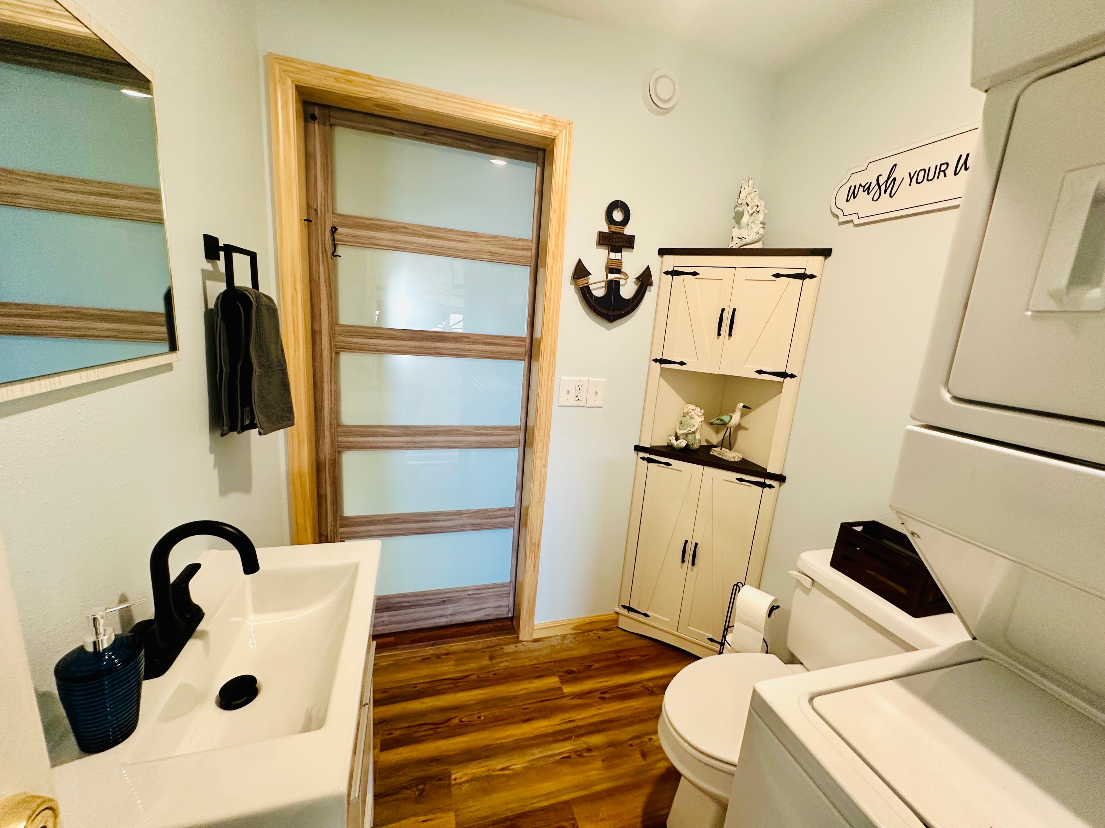 Newly Renovated! Convenient Half Bath with Laundry Amenities