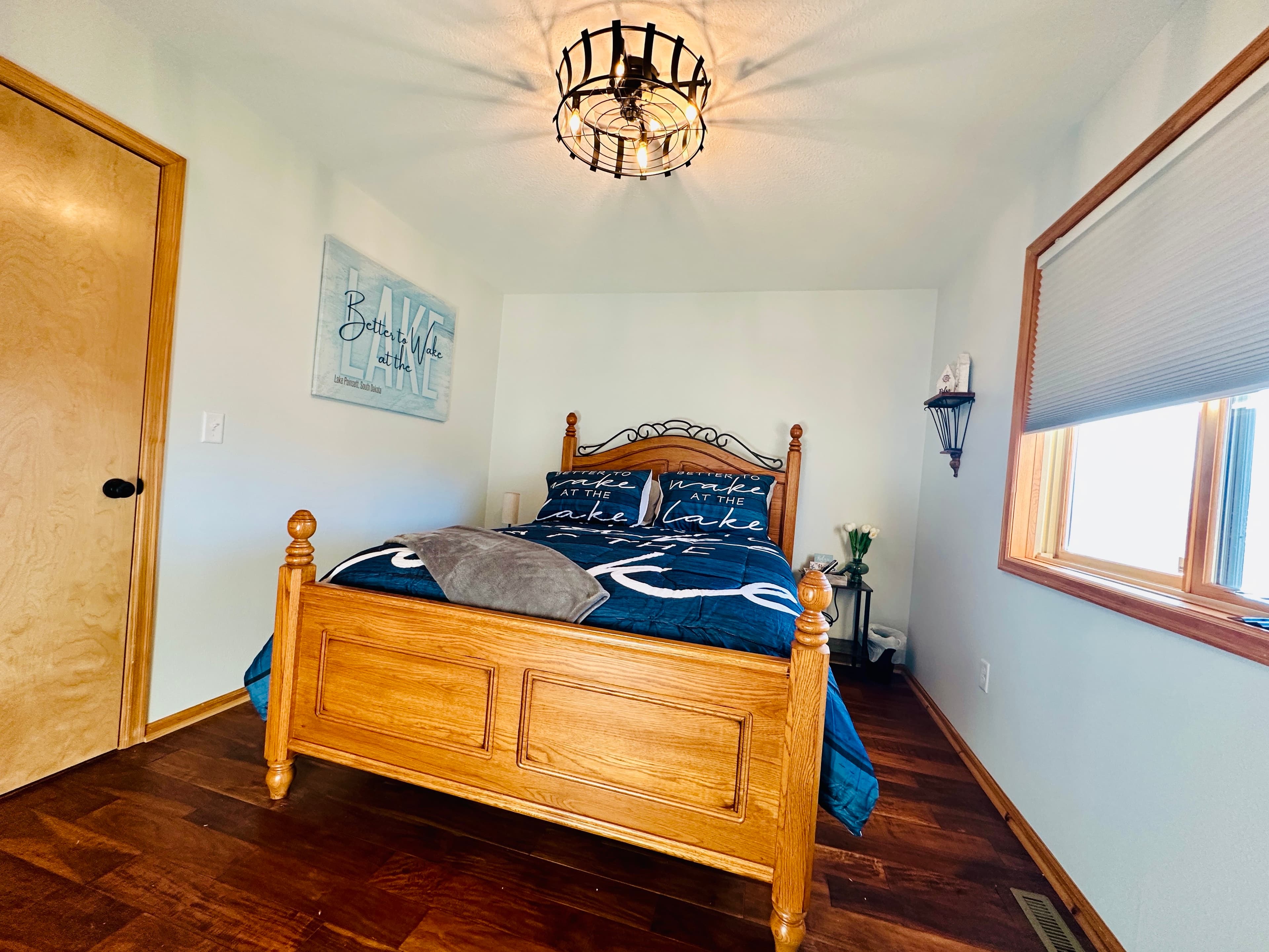 This cozy first-floor bedroom features a classic queen-size bed and a spacious closet—perfect for settling in and feeling right at home.