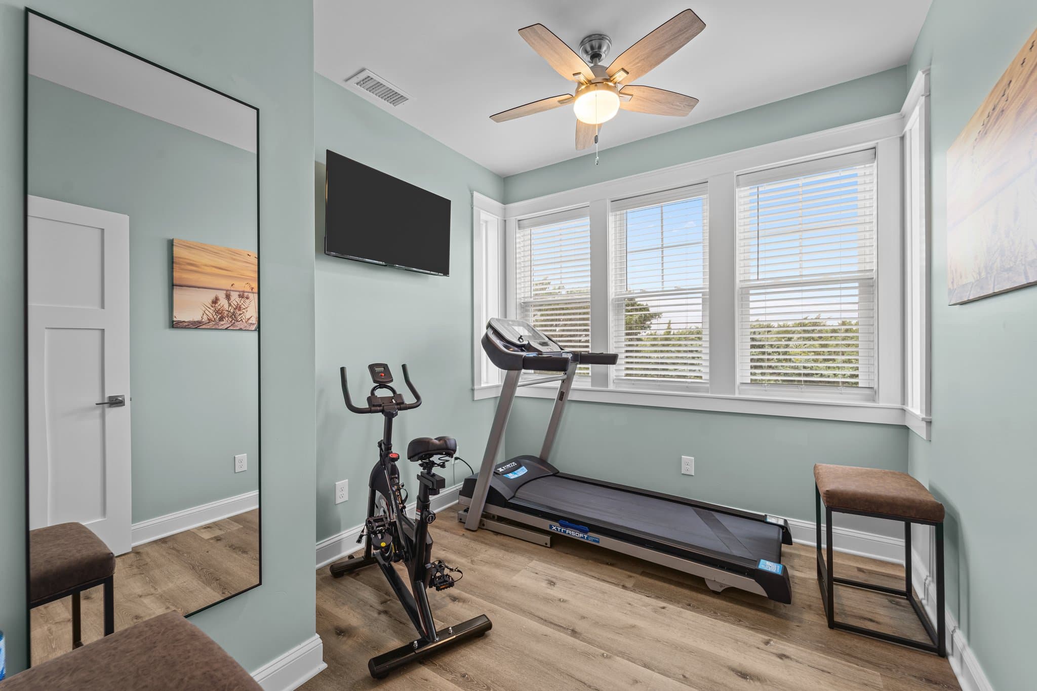 Exercise Room with Treadmill, Stationary Bike, Yoga Mat & Smart TV