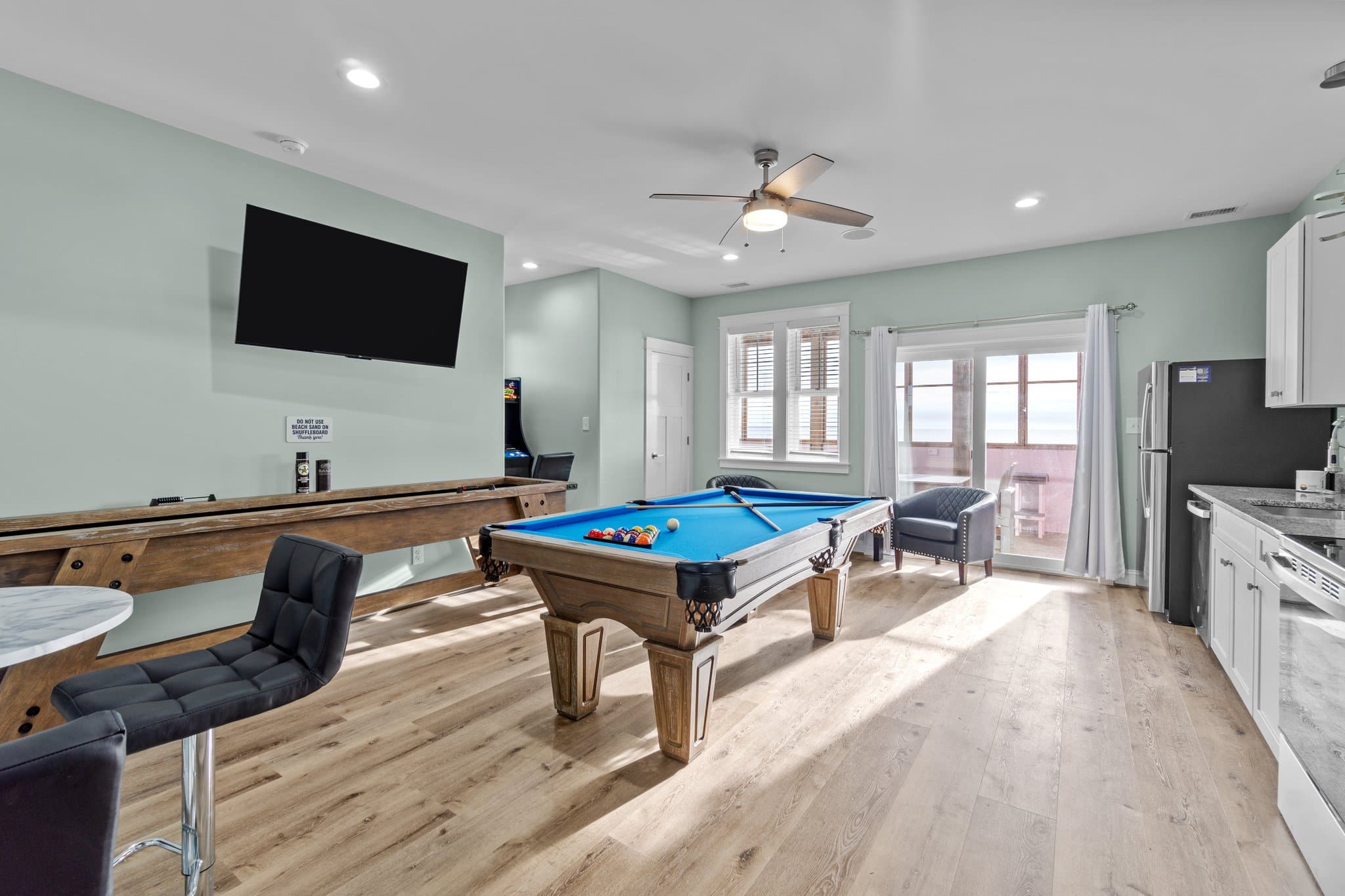Game Room; Pool Table, Shuffleboard, & Arcade Game