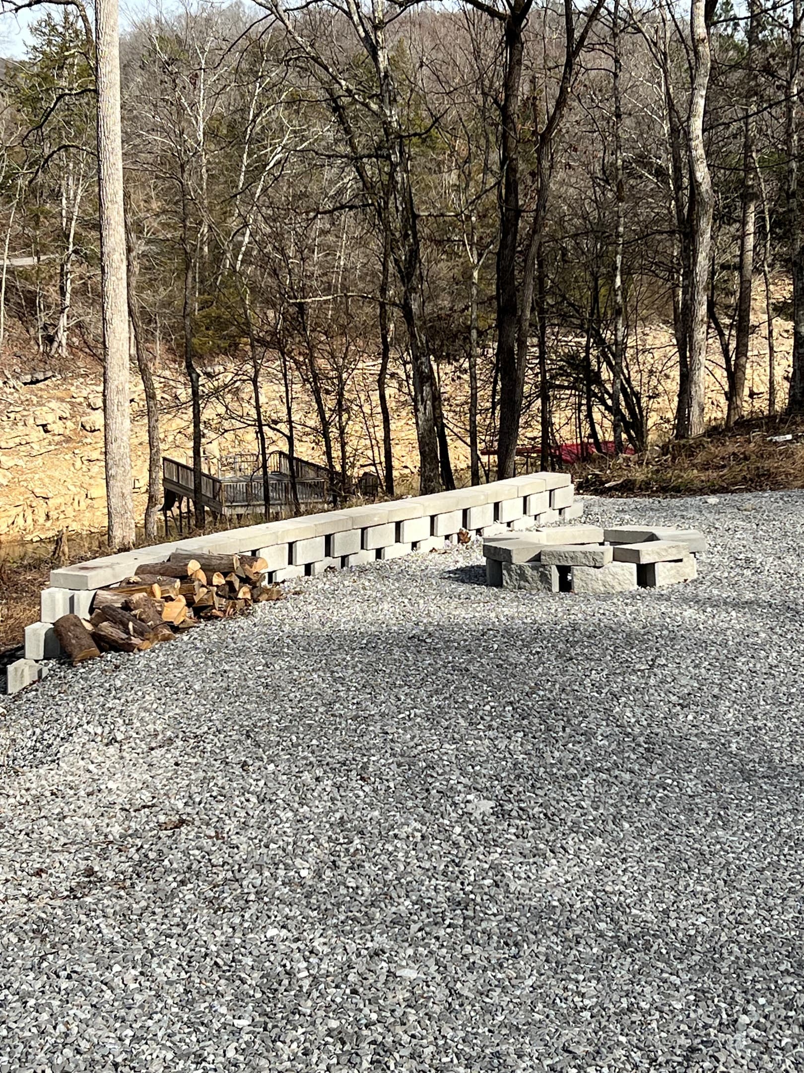 fire pit with plenty of play space around it directly across from the property
