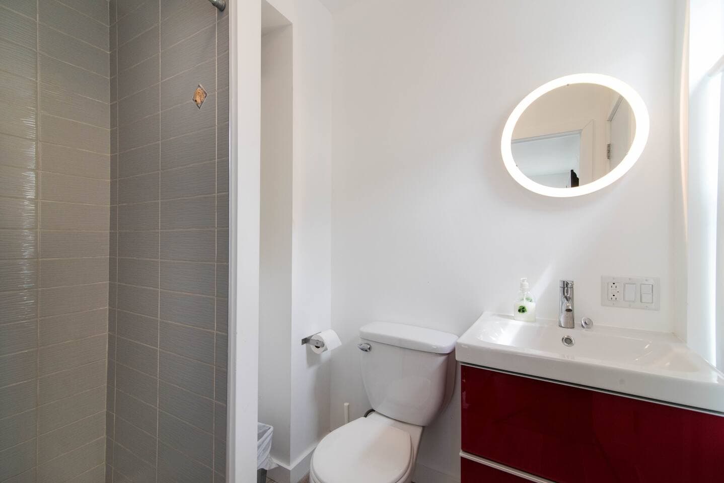 You get to this bathroom from the lake and the house