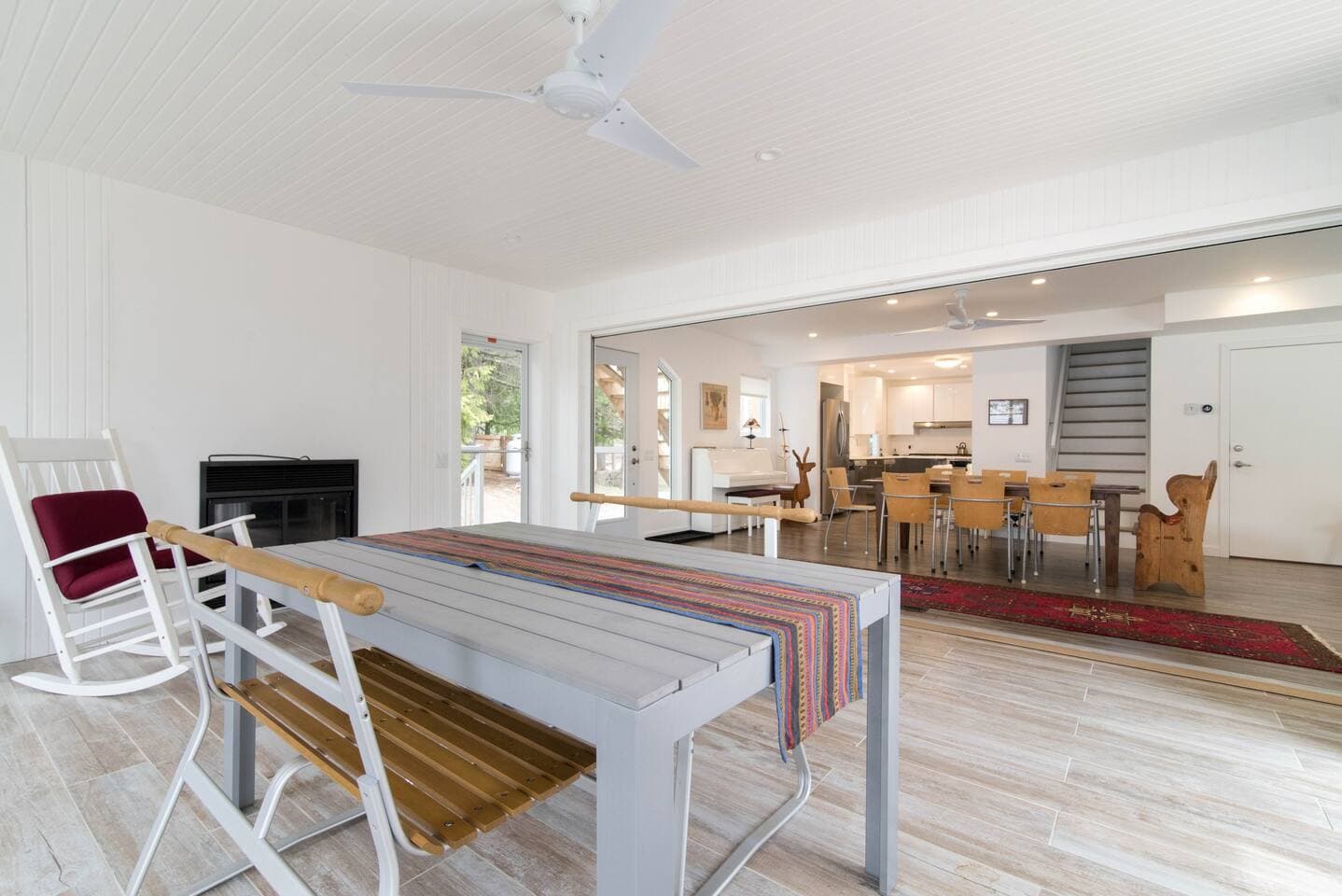 Tables have wheels so set up dining in screened in porch