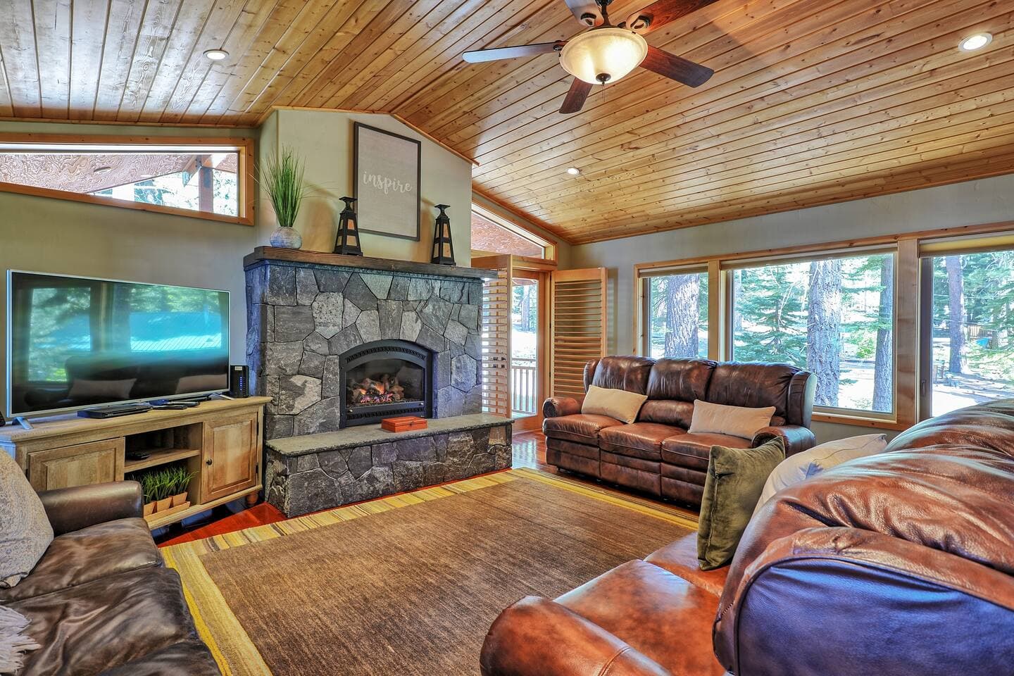 Gather around the warm crackling fire with a cup of hot cocoa or coffee and pine tree views.