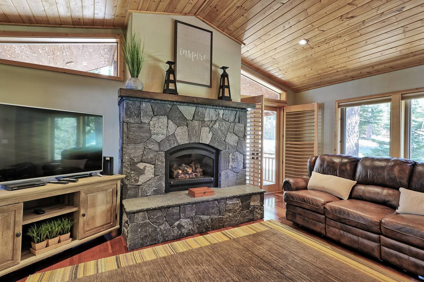 The warm and inviting stone fireplace to gather around and plan your next Tahoe adventures.